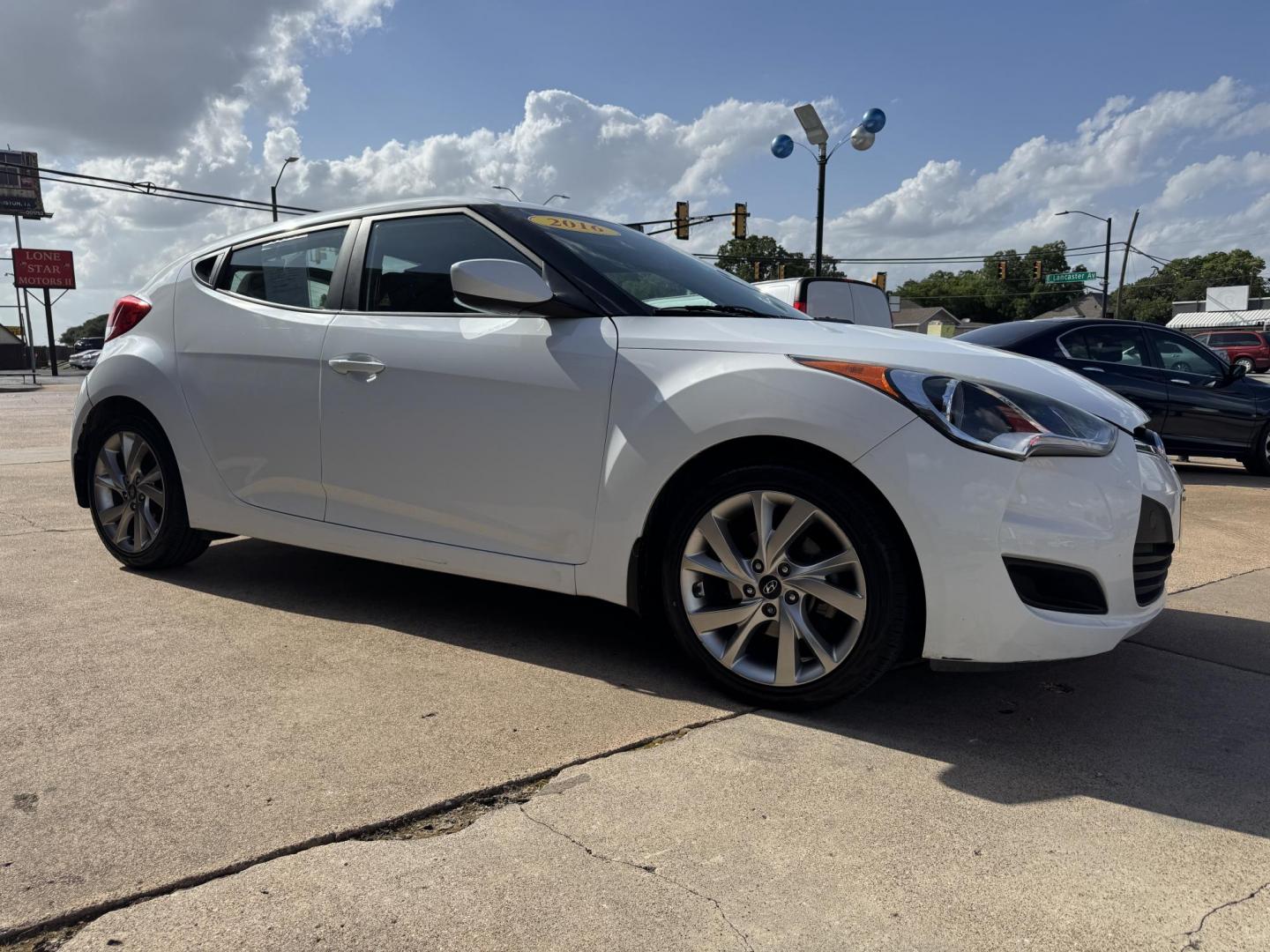 2016 WHITE /Gray HYUNDAI VELOSTER Base 3dr Coupe (KMHTC6AD7GU) with an 1.6L I4 engine, Automatic 6-Speed transmission, located at 5900 E. Lancaster Ave., Fort Worth, TX, 76112, (817) 457-5456, 0.000000, 0.000000 - This is a 2016 Hyundai Veloster Base 3dr Coupe that is in excellent condition. There are no dents or scratches. The interior is clean with no rips or tears or stains. All power windows, door locks and seats. Ice cold AC for those hot Texas summer days. It is equipped with a CD player, AM/FM radio, A - Photo#2