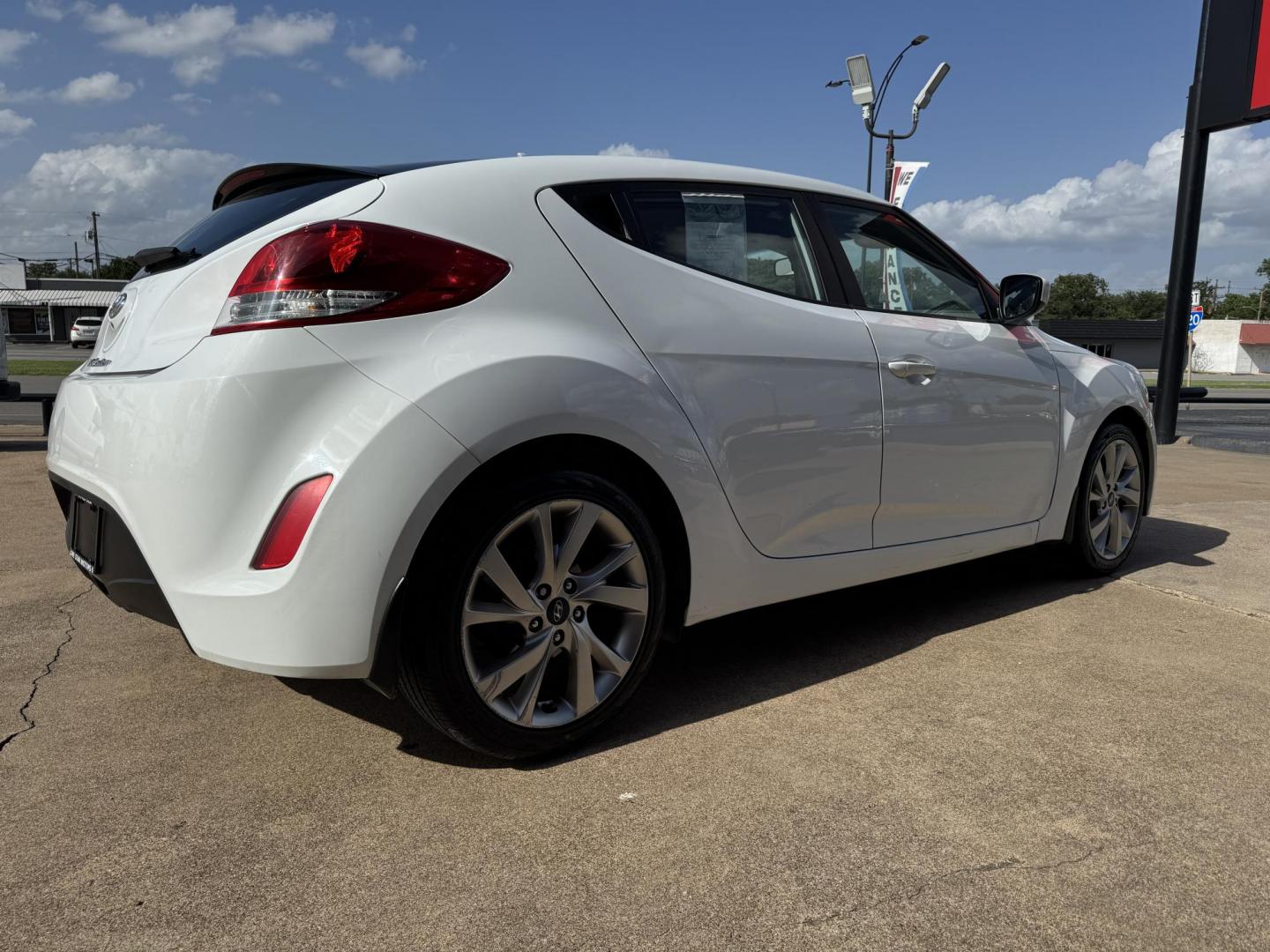 2016 WHITE /Gray HYUNDAI VELOSTER Base 3dr Coupe (KMHTC6AD7GU) with an 1.6L I4 engine, Automatic 6-Speed transmission, located at 5900 E. Lancaster Ave., Fort Worth, TX, 76112, (817) 457-5456, 0.000000, 0.000000 - This is a 2016 Hyundai Veloster Base 3dr Coupe that is in excellent condition. There are no dents or scratches. The interior is clean with no rips or tears or stains. All power windows, door locks and seats. Ice cold AC for those hot Texas summer days. It is equipped with a CD player, AM/FM radio, A - Photo#3