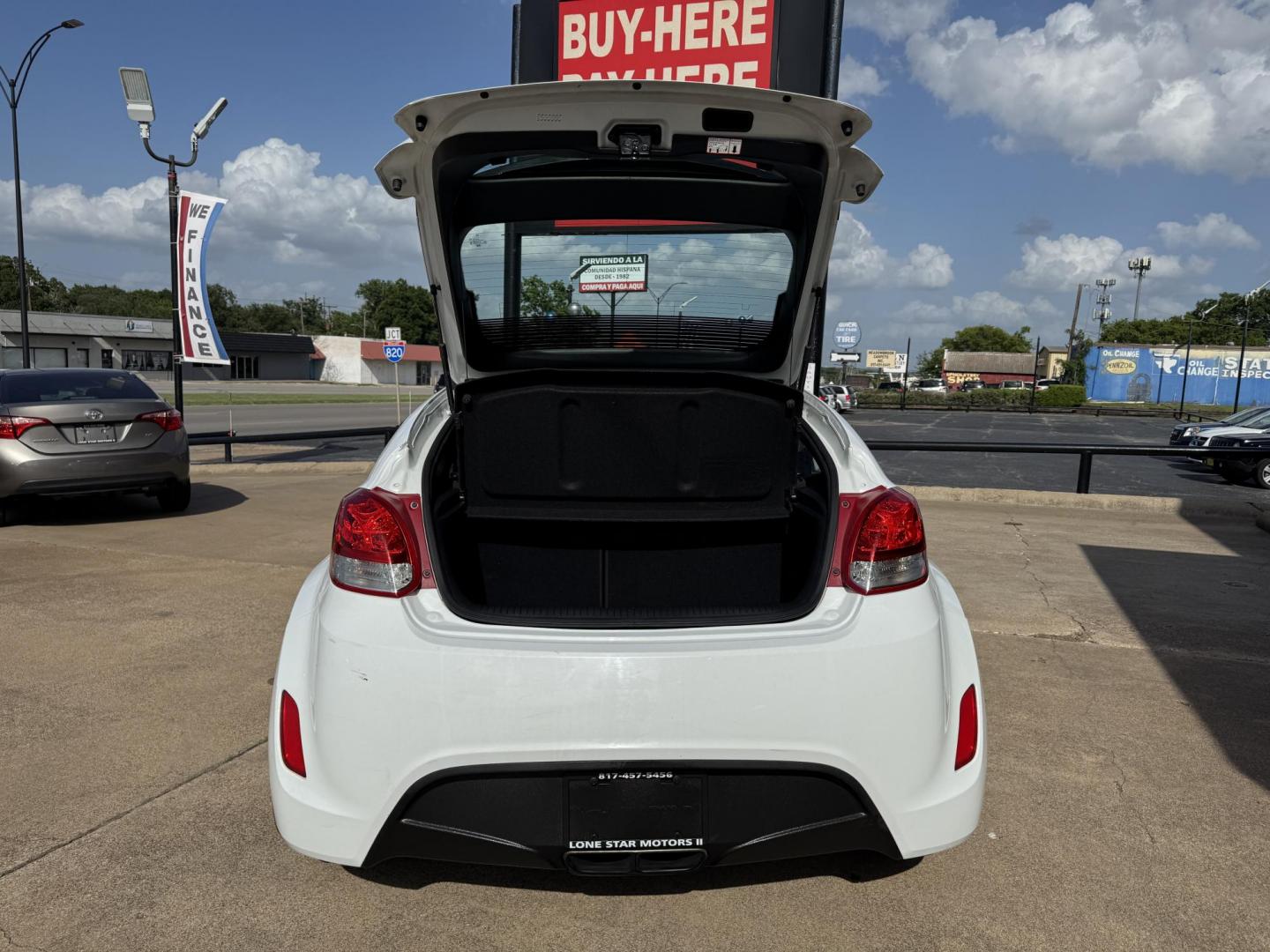 2016 WHITE /Gray HYUNDAI VELOSTER Base 3dr Coupe (KMHTC6AD7GU) with an 1.6L I4 engine, Automatic 6-Speed transmission, located at 5900 E. Lancaster Ave., Fort Worth, TX, 76112, (817) 457-5456, 0.000000, 0.000000 - This is a 2016 Hyundai Veloster Base 3dr Coupe that is in excellent condition. There are no dents or scratches. The interior is clean with no rips or tears or stains. All power windows, door locks and seats. Ice cold AC for those hot Texas summer days. It is equipped with a CD player, AM/FM radio, A - Photo#5