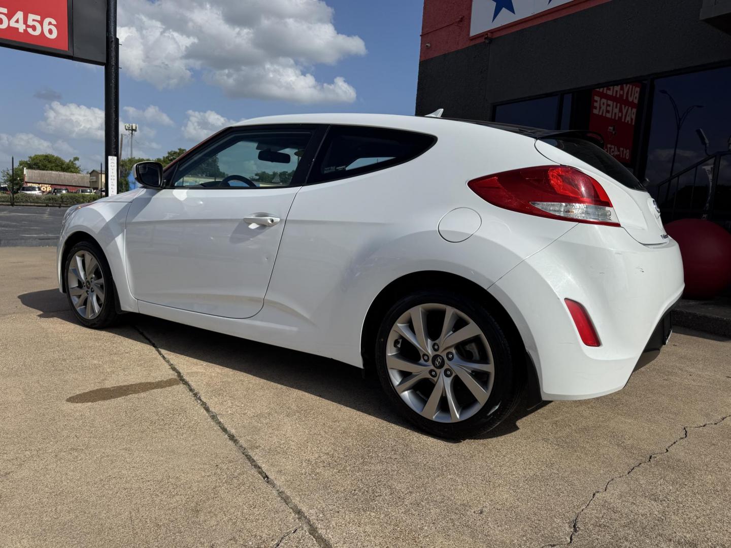 2016 WHITE /Gray HYUNDAI VELOSTER Base 3dr Coupe (KMHTC6AD7GU) with an 1.6L I4 engine, Automatic 6-Speed transmission, located at 5900 E. Lancaster Ave., Fort Worth, TX, 76112, (817) 457-5456, 0.000000, 0.000000 - This is a 2016 Hyundai Veloster Base 3dr Coupe that is in excellent condition. There are no dents or scratches. The interior is clean with no rips or tears or stains. All power windows, door locks and seats. Ice cold AC for those hot Texas summer days. It is equipped with a CD player, AM/FM radio, A - Photo#7