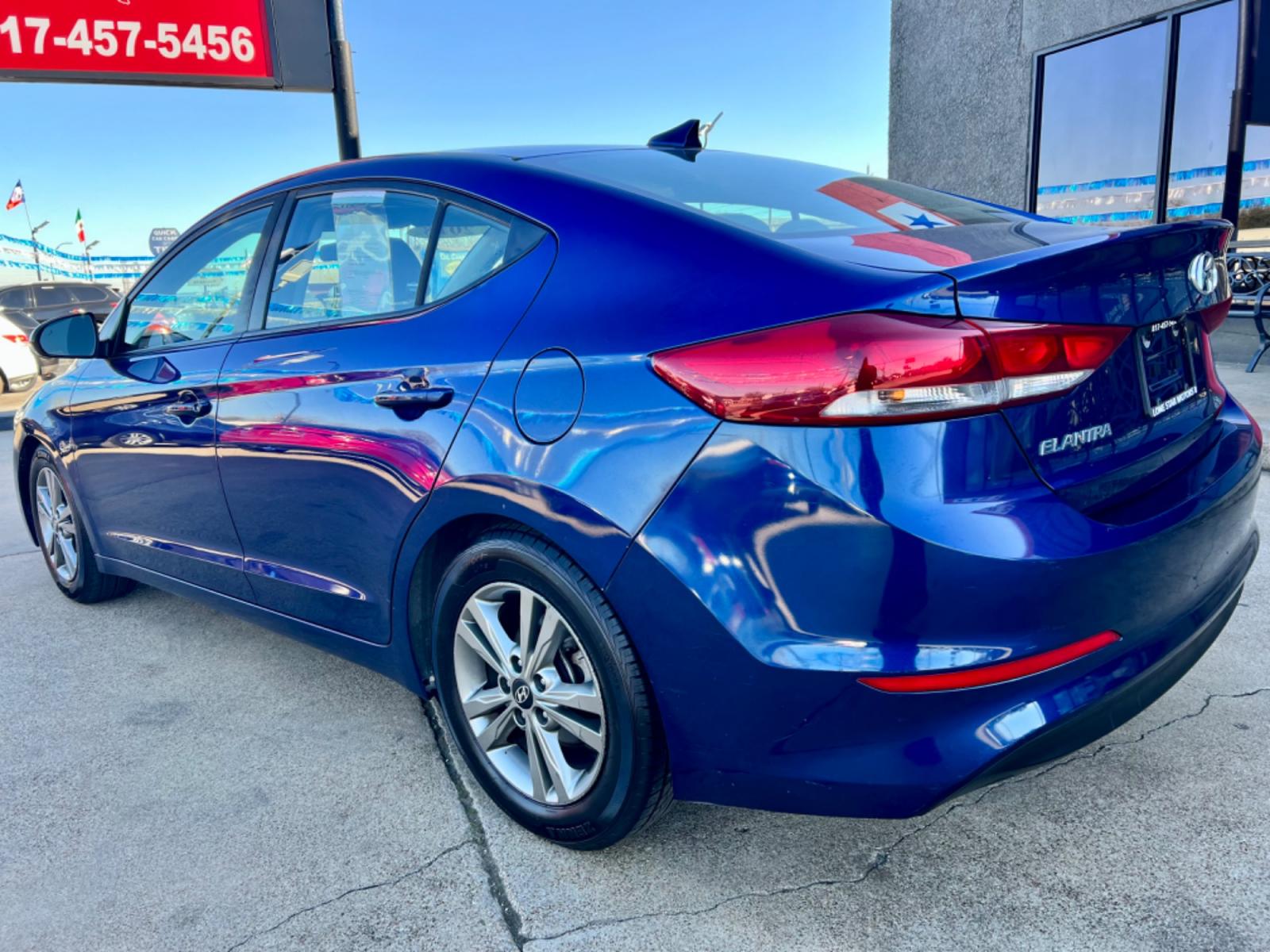 2018 BLUE /Gray HYUNDAI ELANTRA Limited 4dr Sedan (5NPD84LF3JH) with an 2.0L I4 engine, Automatic 6-Speed transmission, located at 5900 E. Lancaster Ave., Fort Worth, TX, 76112, (817) 457-5456, 0.000000, 0.000000 - This is a 2018 HYUNDAI ELANTRA 4 DOOR SEDAN that is in excellent condition. There are no dents or scratches. The interior is clean with no rips or tears or stains. All power windows, door locks and seats. Ice cold AC for those hot Texas summer days. It is equipped with a CD player, AM/FM radio, AUX - Photo #3