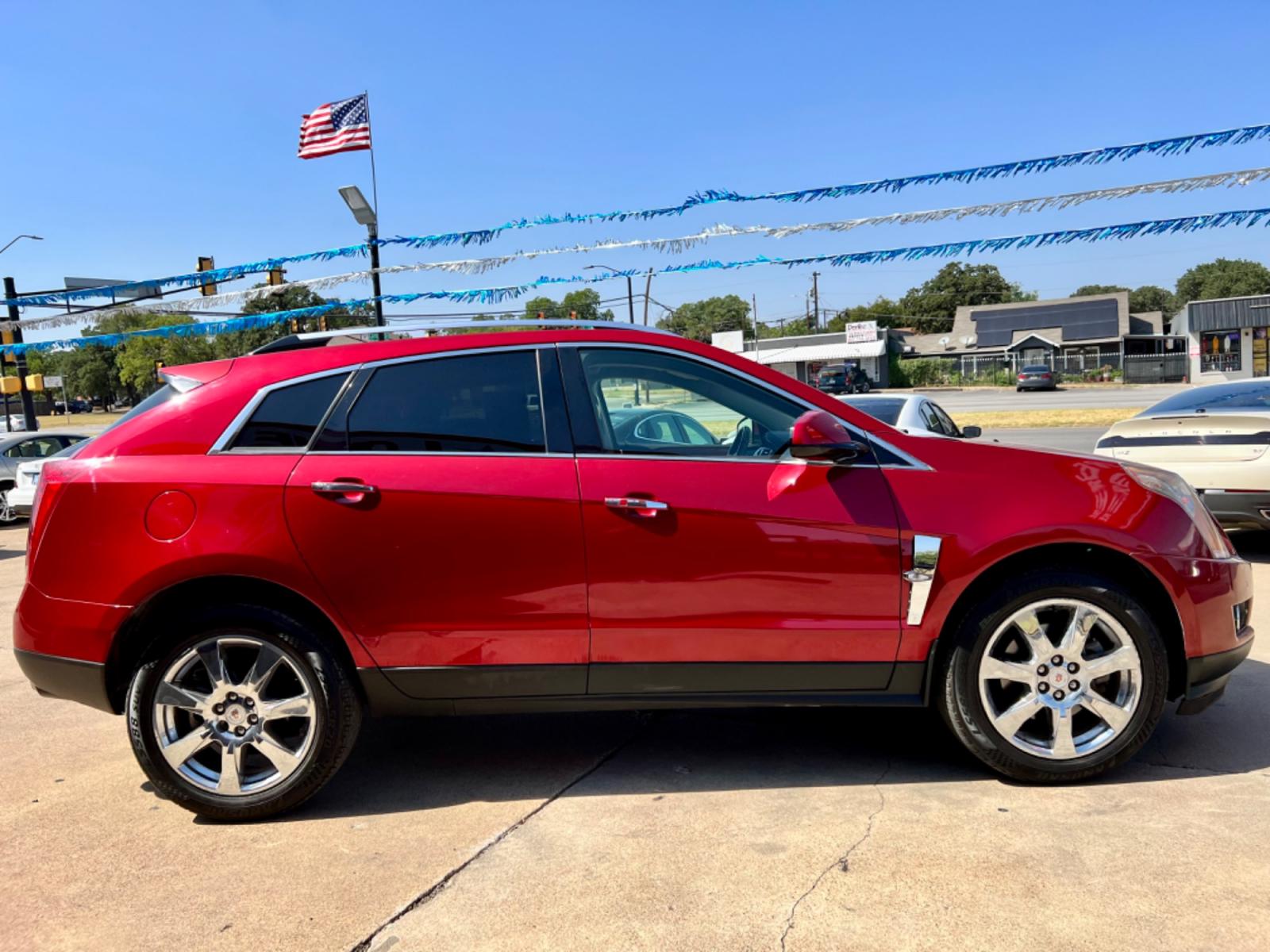 2011 RED /Beige CADILLAC SRX PERFORMANCE Performance Collection 4dr SUV (3GYFNBEY6BS) with an 3.0L V6 engine, Automatic 6-Speed transmission, located at 5900 E. Lancaster Ave., Fort Worth, TX, 76112, (817) 457-5456, 0.000000, 0.000000 - This is a 2011 Cadillac SRX that is in excellent condition. There are no dents or scratches. The interior is clean with no rips or tears or stains. All power windows, door locks and seats. Ice cold AC for those hot Texas summer days. It is equipped with a CD player, AM/FM radio, AUX port, Bluetooth - Photo #7