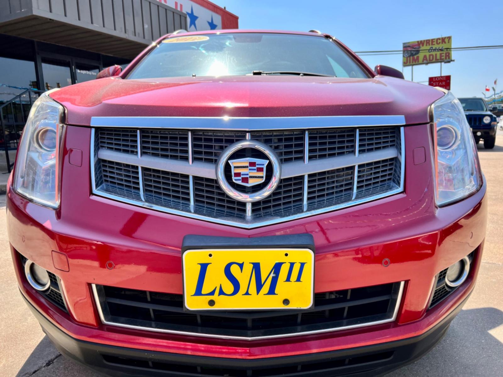 2011 RED /Beige CADILLAC SRX PERFORMANCE Performance Collection 4dr SUV (3GYFNBEY6BS) with an 3.0L V6 engine, Automatic 6-Speed transmission, located at 5900 E. Lancaster Ave., Fort Worth, TX, 76112, (817) 457-5456, 0.000000, 0.000000 - This is a 2011 Cadillac SRX that is in excellent condition. There are no dents or scratches. The interior is clean with no rips or tears or stains. All power windows, door locks and seats. Ice cold AC for those hot Texas summer days. It is equipped with a CD player, AM/FM radio, AUX port, Bluetooth - Photo #2