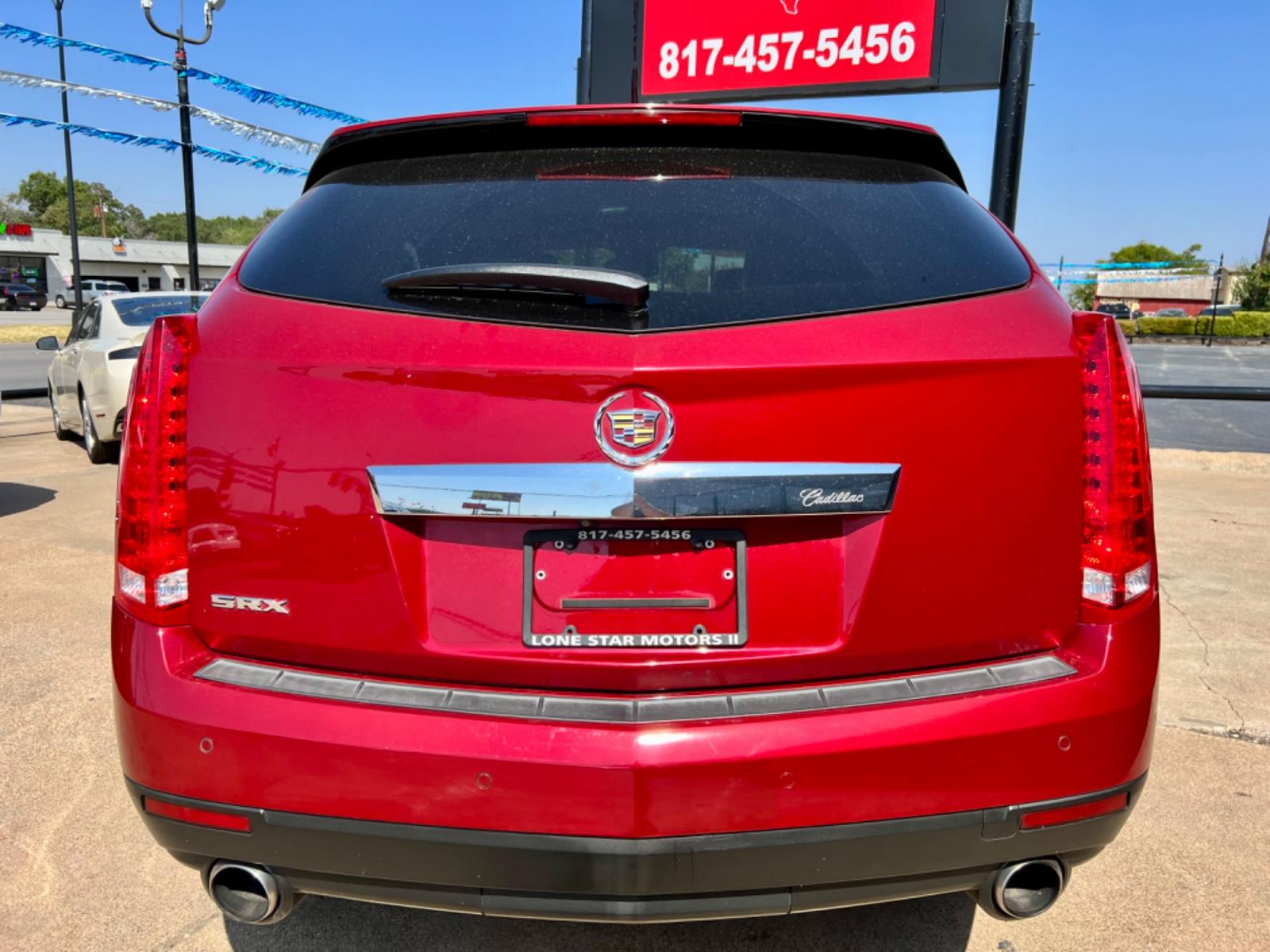 2011 RED /Beige CADILLAC SRX PERFORMANCE Performance Collection 4dr SUV (3GYFNBEY6BS) with an 3.0L V6 engine, Automatic 6-Speed transmission, located at 5900 E. Lancaster Ave., Fort Worth, TX, 76112, (817) 457-5456, 0.000000, 0.000000 - This is a 2011 Cadillac SRX that is in excellent condition. There are no dents or scratches. The interior is clean with no rips or tears or stains. All power windows, door locks and seats. Ice cold AC for those hot Texas summer days. It is equipped with a CD player, AM/FM radio, AUX port, Bluetooth - Photo #5