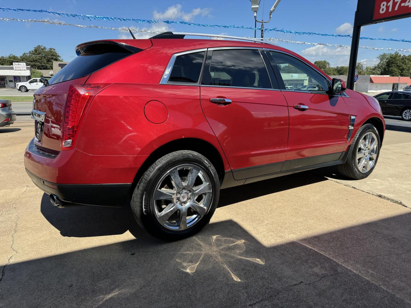 2011 RED /Beige CADILLAC SRX PERFORMANCE Performance Collection 4dr SUV (3GYFNBEY6BS) with an 3.0L V6 engine, Automatic 6-Speed transmission, located at 5900 E. Lancaster Ave., Fort Worth, TX, 76112, (817) 457-5456, 0.000000, 0.000000 - This is a 2011 Cadillac SRX that is in excellent condition. There are no dents or scratches. The interior is clean with no rips or tears or stains. All power windows, door locks and seats. Ice cold AC for those hot Texas summer days. It is equipped with a CD player, AM/FM radio, AUX port, Bluetooth - Photo#4