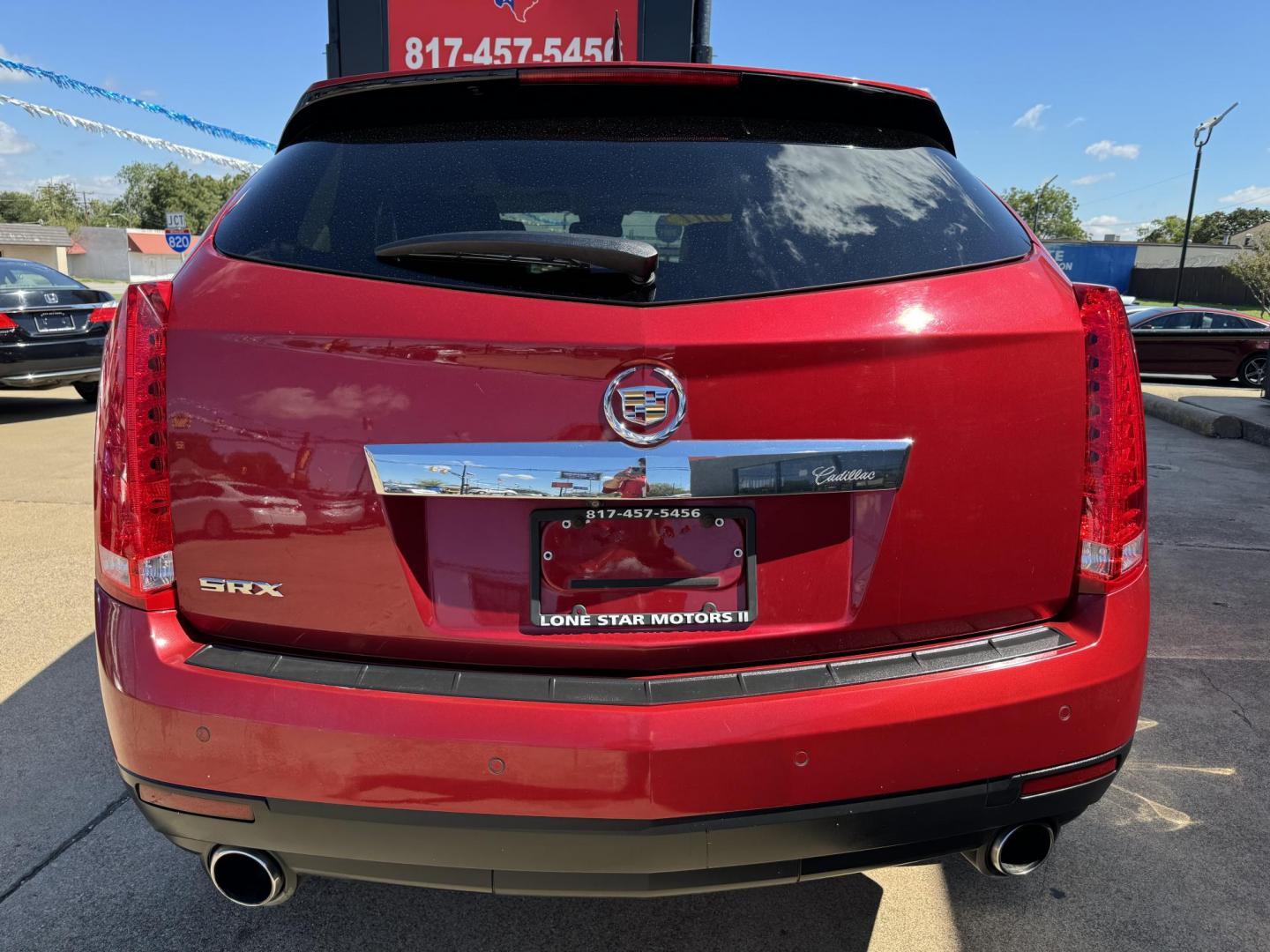 2011 RED /Beige CADILLAC SRX PERFORMANCE Performance Collection 4dr SUV (3GYFNBEY6BS) with an 3.0L V6 engine, Automatic 6-Speed transmission, located at 5900 E. Lancaster Ave., Fort Worth, TX, 76112, (817) 457-5456, 0.000000, 0.000000 - This is a 2011 Cadillac SRX that is in excellent condition. There are no dents or scratches. The interior is clean with no rips or tears or stains. All power windows, door locks and seats. Ice cold AC for those hot Texas summer days. It is equipped with a CD player, AM/FM radio, AUX port, Bluetooth - Photo#5