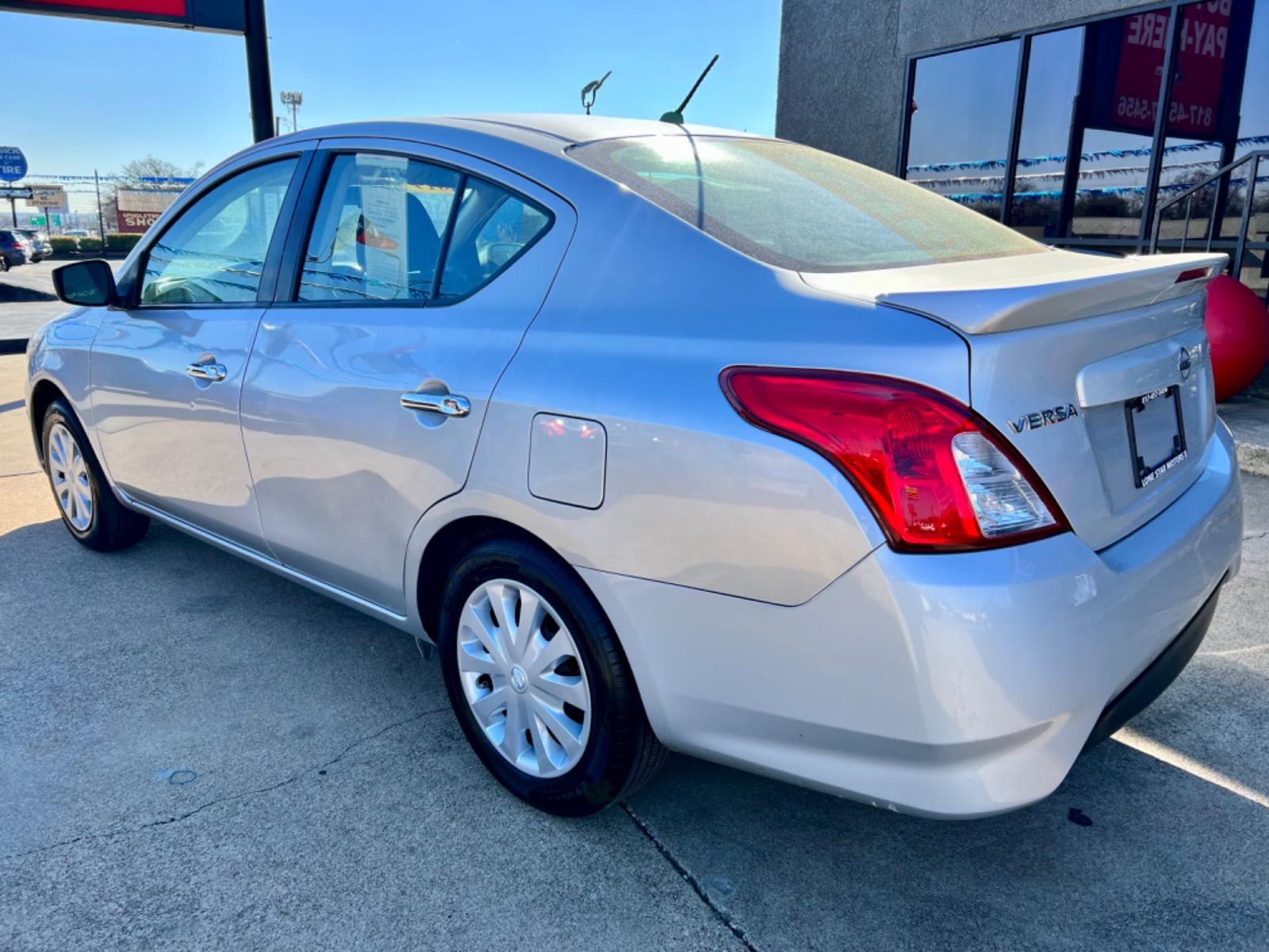 2019 SILVER /Gray NISSAN VERSA S 4dr Sedan (3N1CN7AP5KL) with an 1.6L I4 engine, Automatic 5-Speed transmission, located at 5900 E. Lancaster Ave., Fort Worth, TX, 76112, (817) 457-5456, 0.000000, 0.000000 - This is a 2019 NISSAN VERSA 4 DOOR SEDAN that is in excellent condition. There are no dents or scratches. The interior is clean with no rips or tears or stains. All power windows, door locks and seats. Ice cold AC for those hot Texas summer days. It is equipped with a CD player, AM/FM radio, AUX por - Photo #3