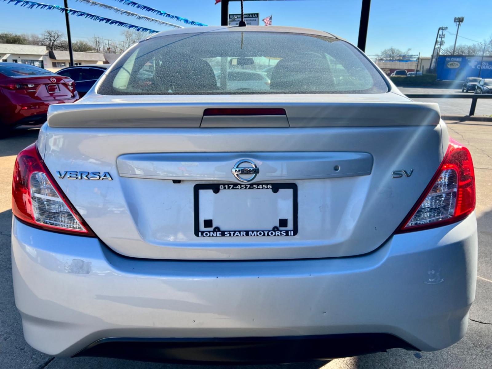 2019 SILVER /Gray NISSAN VERSA S 4dr Sedan (3N1CN7AP5KL) with an 1.6L I4 engine, Automatic 5-Speed transmission, located at 5900 E. Lancaster Ave., Fort Worth, TX, 76112, (817) 457-5456, 0.000000, 0.000000 - This is a 2019 NISSAN VERSA 4 DOOR SEDAN that is in excellent condition. There are no dents or scratches. The interior is clean with no rips or tears or stains. All power windows, door locks and seats. Ice cold AC for those hot Texas summer days. It is equipped with a CD player, AM/FM radio, AUX por - Photo #4