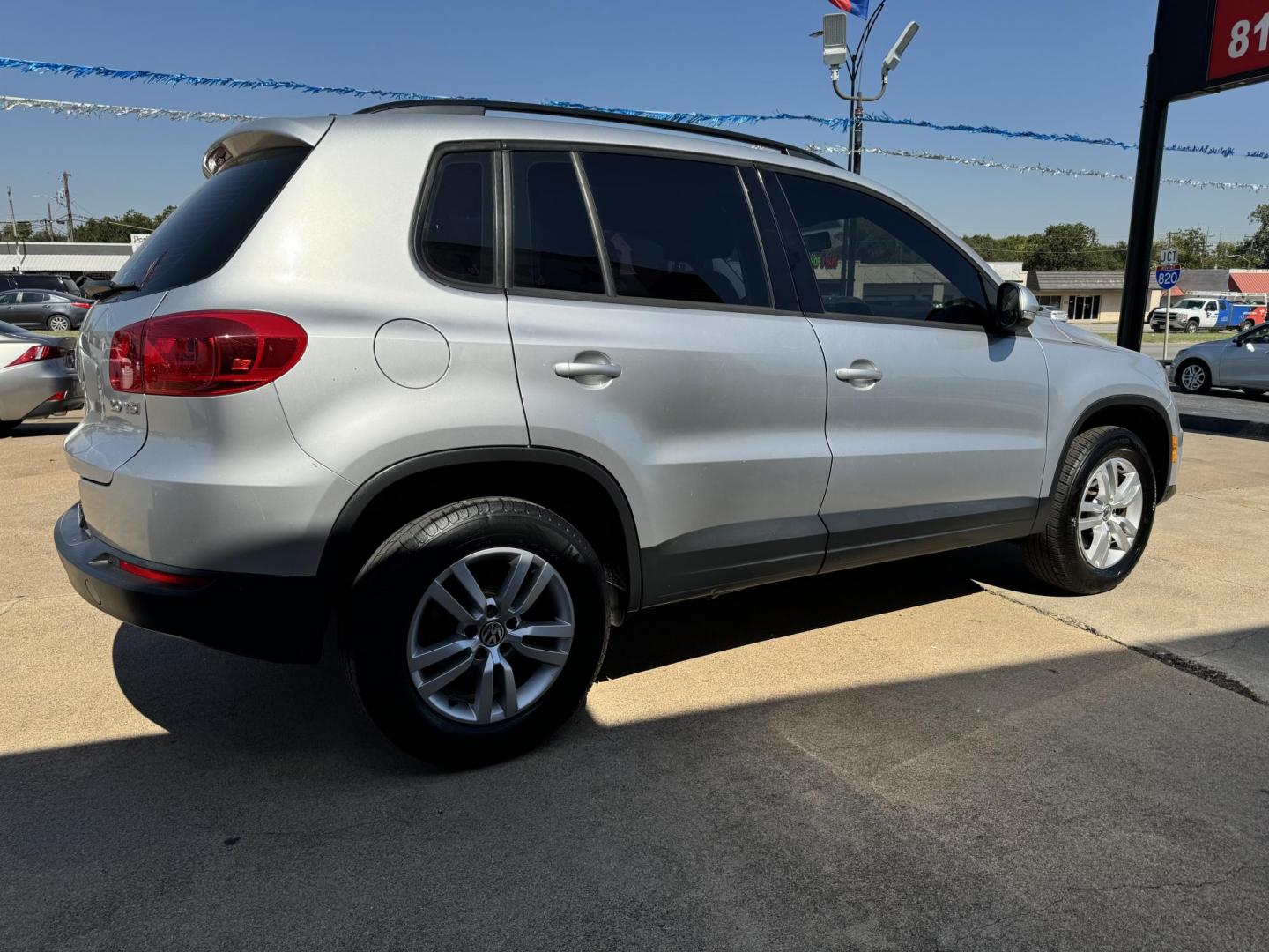 2015 SILVER VOLKSWAGEN TIGUAN S; SE; SEL; W (WVGAV7AX6FW) , located at 5900 E. Lancaster Ave., Fort Worth, TX, 76112, (817) 457-5456, 0.000000, 0.000000 - This is a 2015 VOLKSWAGEN TIGUAN 4 DR SUV that is in excellent condition. The interior is clean with no rips or tears or stains. All power windows, door locks and seats. Ice cold AC for those hot Texas summer days. It is equipped with a CD player, AM/FM radio, AUX port, Bluetooth connectivity and Si - Photo#4