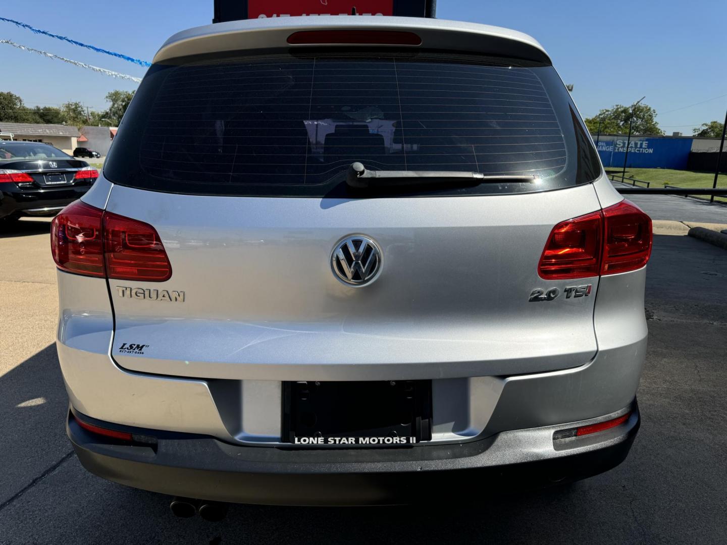 2015 SILVER VOLKSWAGEN TIGUAN S; SE; SEL; W (WVGAV7AX6FW) , located at 5900 E. Lancaster Ave., Fort Worth, TX, 76112, (817) 457-5456, 0.000000, 0.000000 - This is a 2015 VOLKSWAGEN TIGUAN 4 DR SUV that is in excellent condition. The interior is clean with no rips or tears or stains. All power windows, door locks and seats. Ice cold AC for those hot Texas summer days. It is equipped with a CD player, AM/FM radio, AUX port, Bluetooth connectivity and Si - Photo#5