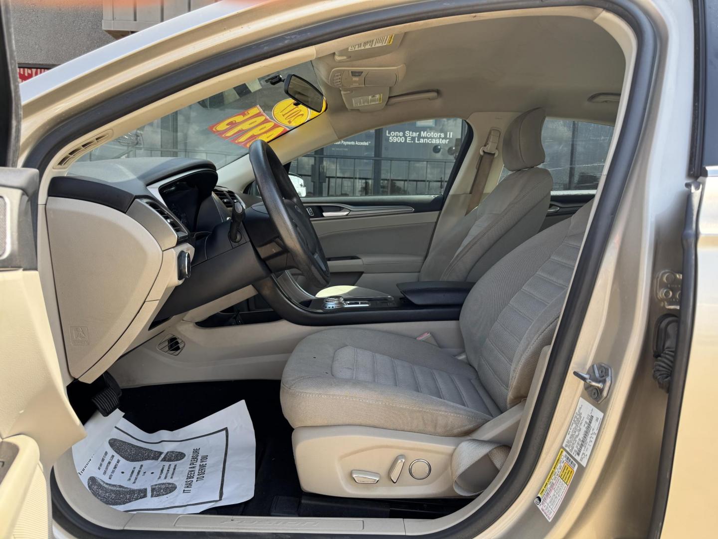 2017 GOLD FORD FUSION (3FA6P0H72HR) , located at 5900 E. Lancaster Ave., Fort Worth, TX, 76112, (817) 457-5456, 0.000000, 0.000000 - 2017 Ford Fusion – 4-Door Sedan | Cash Only Looking for a budget-friendly ride that gets you where you need to go? Check out this 2017 Ford Fusion available now for $4,995 cash only at Lone Star Motors II! ? Cold A/C ? Push to Start ? Backup Camera ? Smooth Drive ? Spacious Interior T - Photo#8
