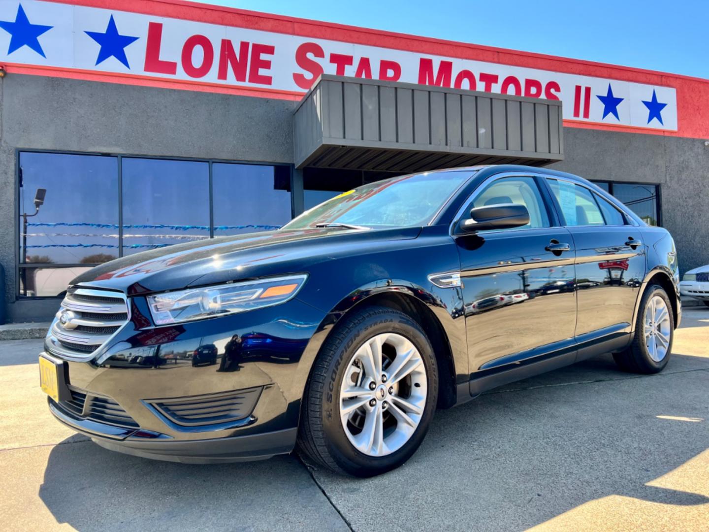 2017 BLACK FORD TAURUS (1FAHP2D81HG) , located at 5900 E. Lancaster Ave., Fort Worth, TX, 76112, (817) 457-5456, 0.000000, 0.000000 - This is a 2017 FORD TAURUS 4 DOOR SEDAN that is in excellent condition. There are no dents or scratches. The interior is clean with no rips or tears or stains. All power windows, door locks and seats. Ice cold AC for those hot Texas summer days. It is equipped with a CD player, AM/FM radio, AUX port - Photo#1