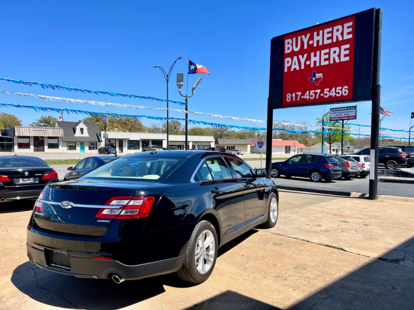 2017 BLACK FORD TAURUS (1FAHP2D81HG) , located at 5900 E. Lancaster Ave., Fort Worth, TX, 76112, (817) 457-5456, 0.000000, 0.000000 - This is a 2017 FORD TAURUS 4 DOOR SEDAN that is in excellent condition. There are no dents or scratches. The interior is clean with no rips or tears or stains. All power windows, door locks and seats. Ice cold AC for those hot Texas summer days. It is equipped with a CD player, AM/FM radio, AUX port - Photo#6