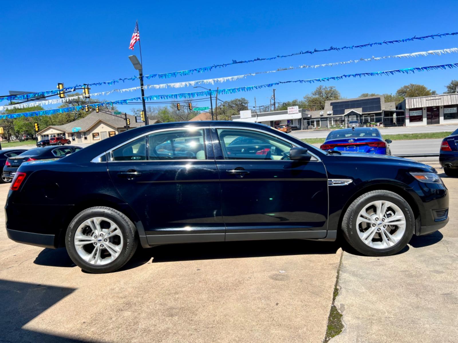 2017 BLACK FORD TAURUS (1FAHP2D81HG) , located at 5900 E. Lancaster Ave., Fort Worth, TX, 76112, (817) 457-5456, 0.000000, 0.000000 - Photo #7