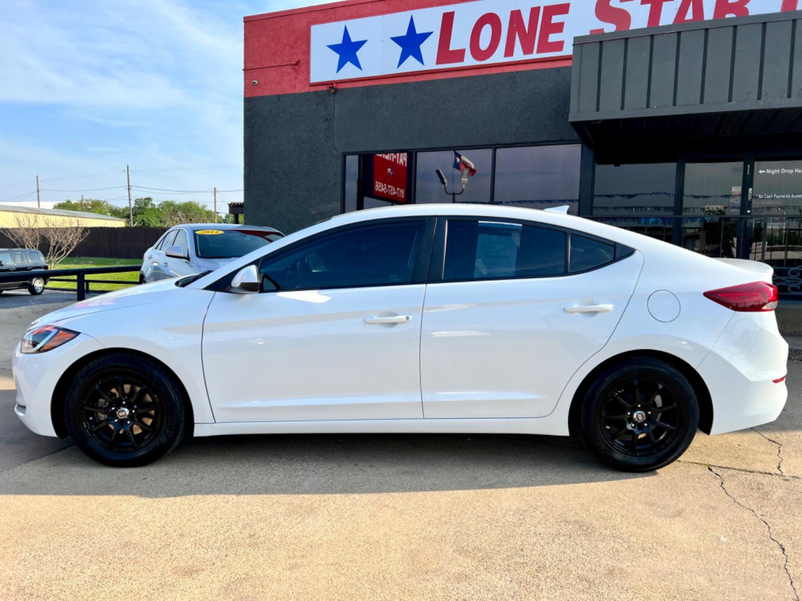 2017 WHITE HYUNDAI ELANTRA (5NPD74LF7HH) , located at 5900 E. Lancaster Ave., Fort Worth, TX, 76112, (817) 457-5456, 0.000000, 0.000000 - This is a 2017 HYUNDAI ELANTRA 4 DOOR SEDAN that is in excellent condition. There are no dents or scratches. The interior is clean with no rips or tears or stains. All power windows, door locks and seats. Ice cold AC for those hot Texas summer days. It is equipped with a CD player, AM/FM radio, AUX - Photo #2