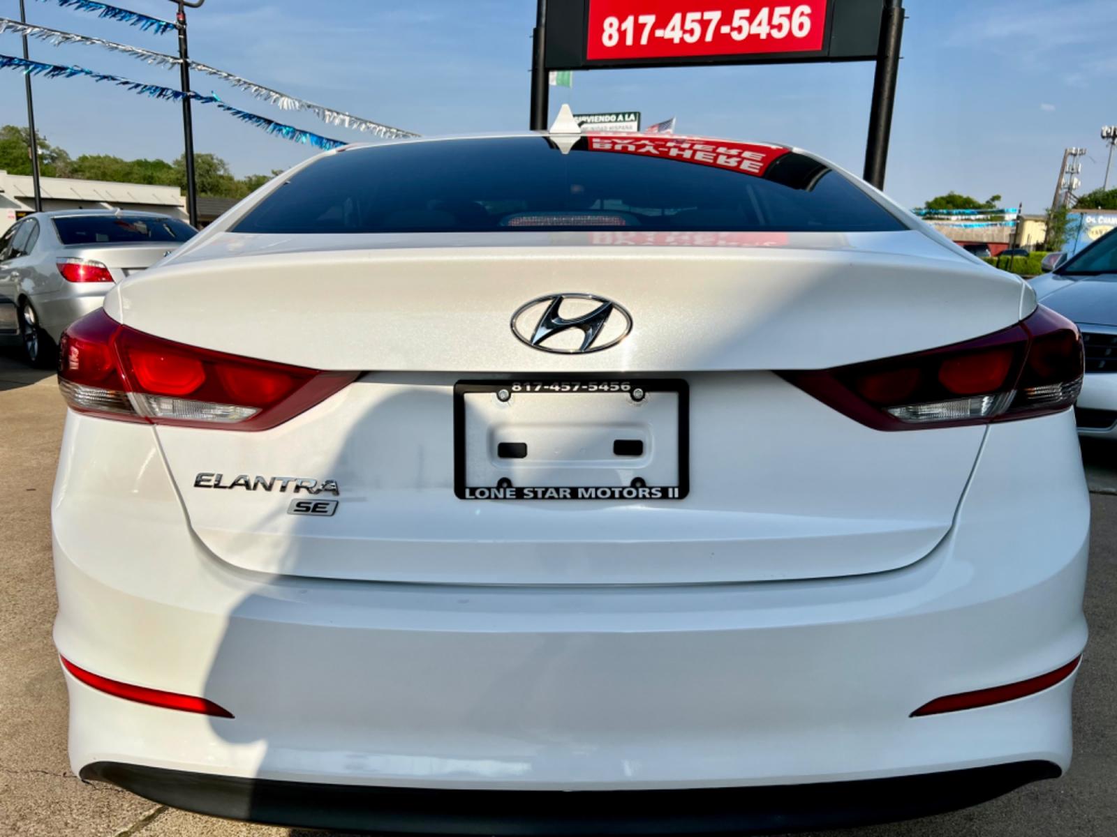 2017 WHITE HYUNDAI ELANTRA (5NPD74LF7HH) , located at 5900 E. Lancaster Ave., Fort Worth, TX, 76112, (817) 457-5456, 0.000000, 0.000000 - This is a 2017 HYUNDAI ELANTRA 4 DOOR SEDAN that is in excellent condition. There are no dents or scratches. The interior is clean with no rips or tears or stains. All power windows, door locks and seats. Ice cold AC for those hot Texas summer days. It is equipped with a CD player, AM/FM radio, AUX - Photo #4
