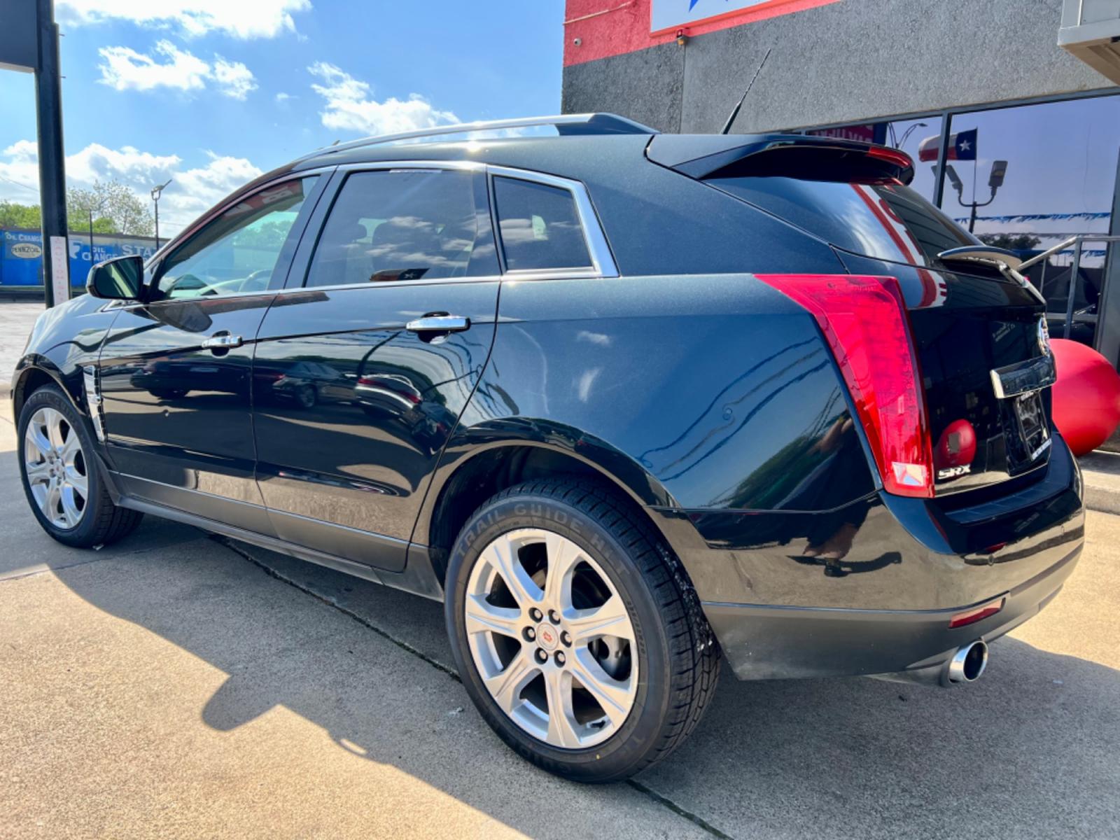 2011 BLACK CADILLAC SRX (3GYFNCEY0BS) , located at 5900 E. Lancaster Ave., Fort Worth, TX, 76112, (817) 457-5456, 0.000000, 0.000000 - This is a 2011 CADILLAC SRX 4 DOOR WAGON that is in excellent condition. There are no dents or scratches. The interior is clean with no rips or tears or stains. All power windows, door locks and seats. Ice cold AC for those hot Texas summer days. It is equipped with a CD player, AM/FM radio, AUX por - Photo #3