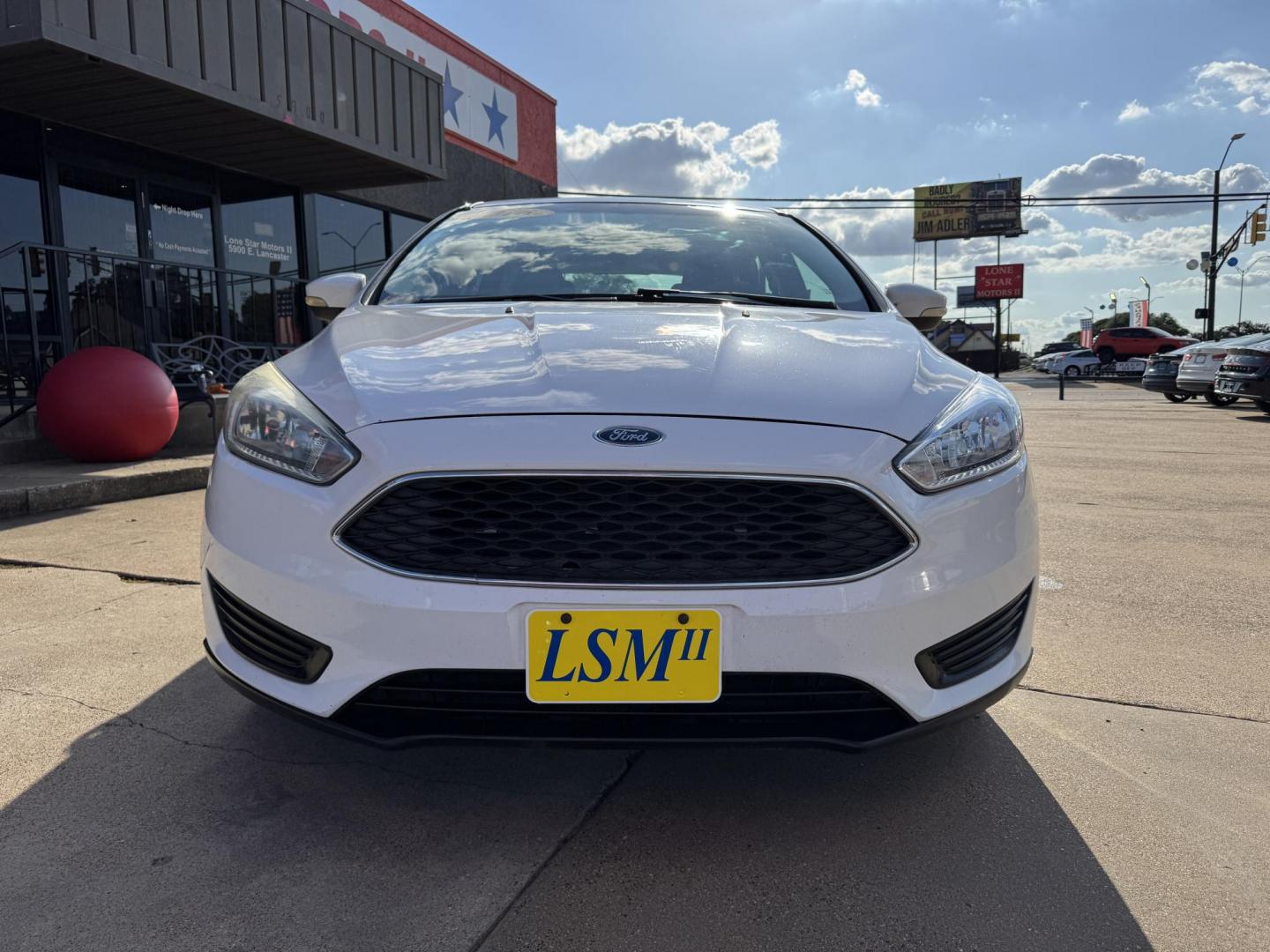 2016 WHITE FORD FOCUS (1FADP3K23GL) , located at 5900 E. Lancaster Ave., Fort Worth, TX, 76112, (817) 457-5456, 0.000000, 0.000000 - This is a 2016 FORD FOCUS 4 DOOR HATCHBACK that is in excellent condition. There are no dents or scratches. The interior is clean with no rips or tears or stains. All power windows, door locks and seats. Ice cold AC for those hot Texas summer days. It is equipped with a CD player, AM/FM radio, AUX p - Photo#1