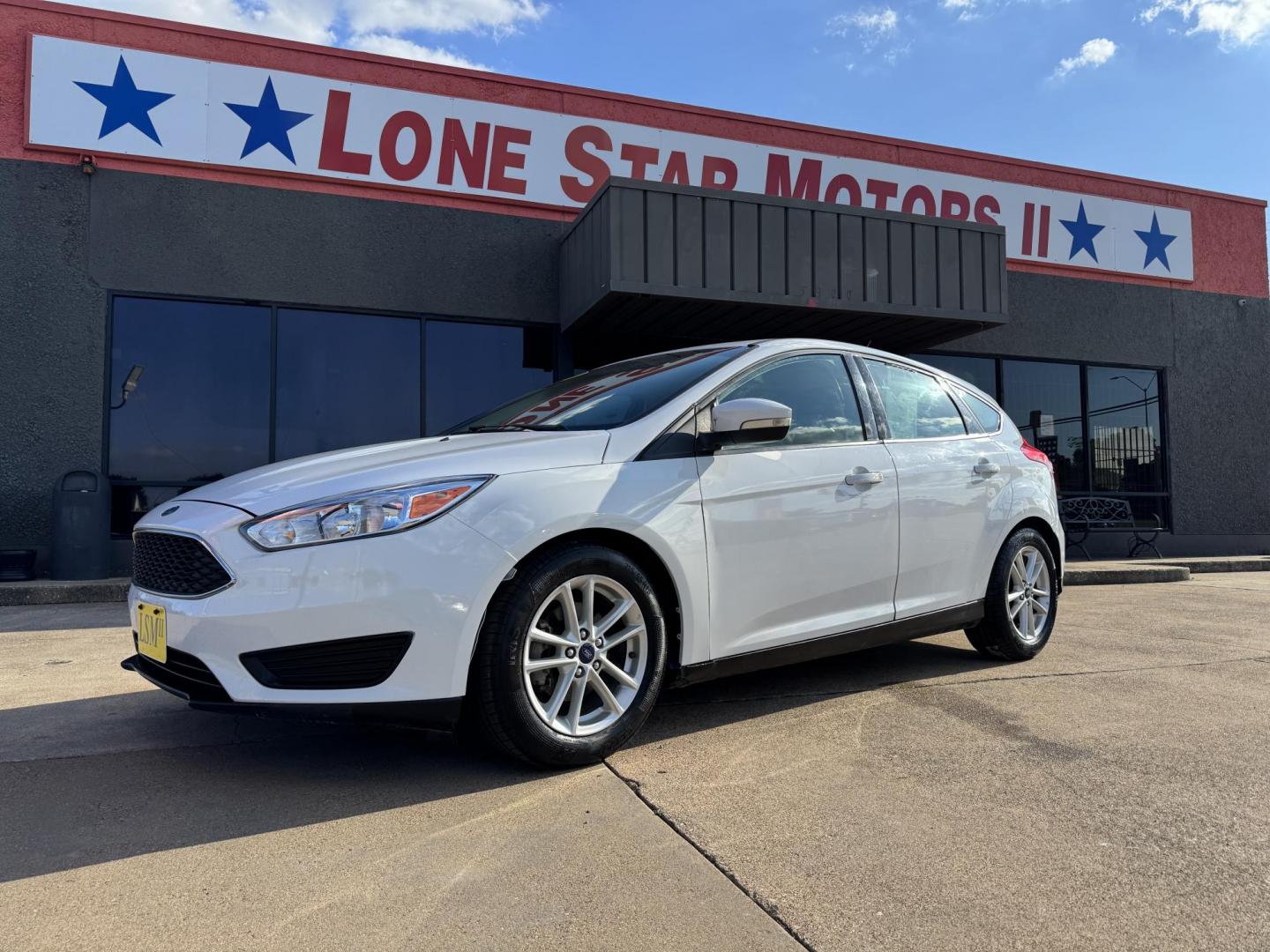 2016 WHITE FORD FOCUS (1FADP3K23GL) , located at 5900 E. Lancaster Ave., Fort Worth, TX, 76112, (817) 457-5456, 0.000000, 0.000000 - This is a 2016 FORD FOCUS 4 DOOR HATCHBACK that is in excellent condition. There are no dents or scratches. The interior is clean with no rips or tears or stains. All power windows, door locks and seats. Ice cold AC for those hot Texas summer days. It is equipped with a CD player, AM/FM radio, AUX p - Photo#0