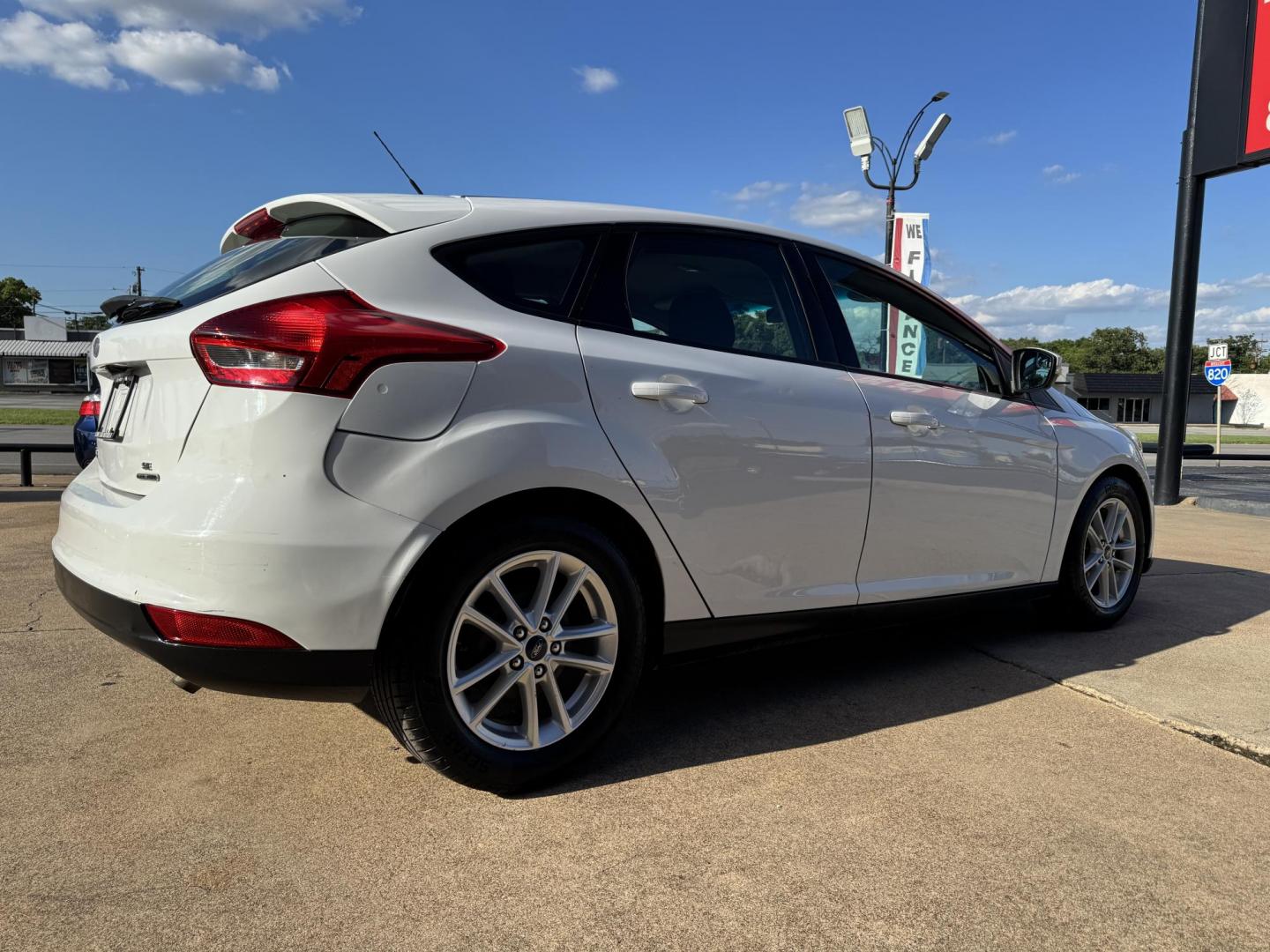 2016 WHITE FORD FOCUS (1FADP3K23GL) , located at 5900 E. Lancaster Ave., Fort Worth, TX, 76112, (817) 457-5456, 0.000000, 0.000000 - This is a 2016 FORD FOCUS 4 DOOR HATCHBACK that is in excellent condition. There are no dents or scratches. The interior is clean with no rips or tears or stains. All power windows, door locks and seats. Ice cold AC for those hot Texas summer days. It is equipped with a CD player, AM/FM radio, AUX p - Photo#3