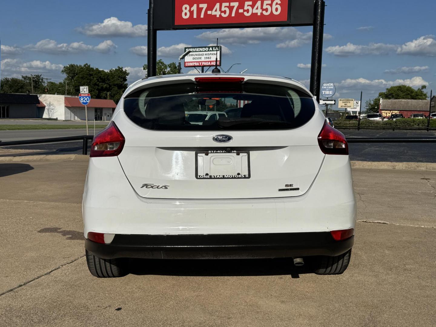 2016 WHITE FORD FOCUS (1FADP3K23GL) , located at 5900 E. Lancaster Ave., Fort Worth, TX, 76112, (817) 457-5456, 0.000000, 0.000000 - This is a 2016 FORD FOCUS 4 DOOR HATCHBACK that is in excellent condition. There are no dents or scratches. The interior is clean with no rips or tears or stains. All power windows, door locks and seats. Ice cold AC for those hot Texas summer days. It is equipped with a CD player, AM/FM radio, AUX p - Photo#4
