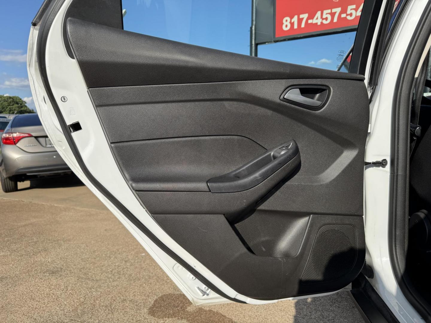 2016 WHITE FORD FOCUS (1FADP3K23GL) , located at 5900 E. Lancaster Ave., Fort Worth, TX, 76112, (817) 457-5456, 0.000000, 0.000000 - This is a 2016 FORD FOCUS 4 DOOR HATCHBACK that is in excellent condition. There are no dents or scratches. The interior is clean with no rips or tears or stains. All power windows, door locks and seats. Ice cold AC for those hot Texas summer days. It is equipped with a CD player, AM/FM radio, AUX p - Photo#10