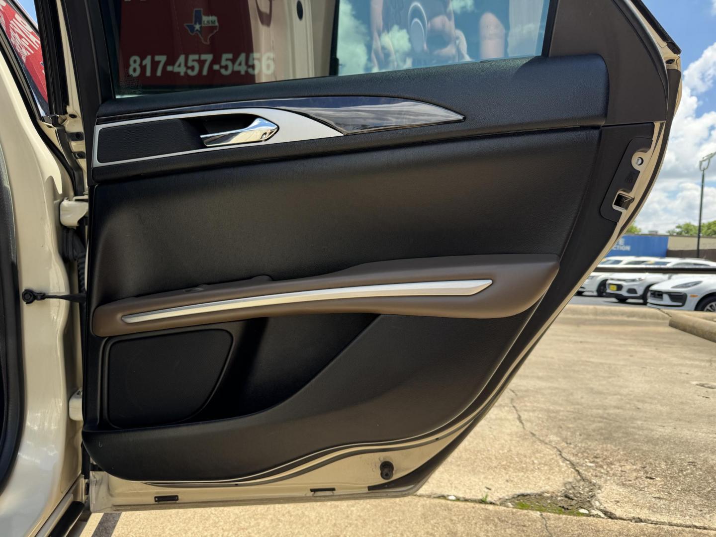 2016 TAN LINCOLN MKZ (3LN6L2GK8GR) , located at 5900 E. Lancaster Ave., Fort Worth, TX, 76112, (817) 457-5456, 0.000000, 0.000000 - This is a 2016 LINCOLN MKZ 4 DOOR SEDAN that is in excellent condition. There are no dents or scratches. The interior is clean with no rips or tears or stains. All power windows, door locks and seats. Ice cold AC for those hot Texas summer days. It is equipped with a CD player, AM/FM radio, AUX port - Photo#12
