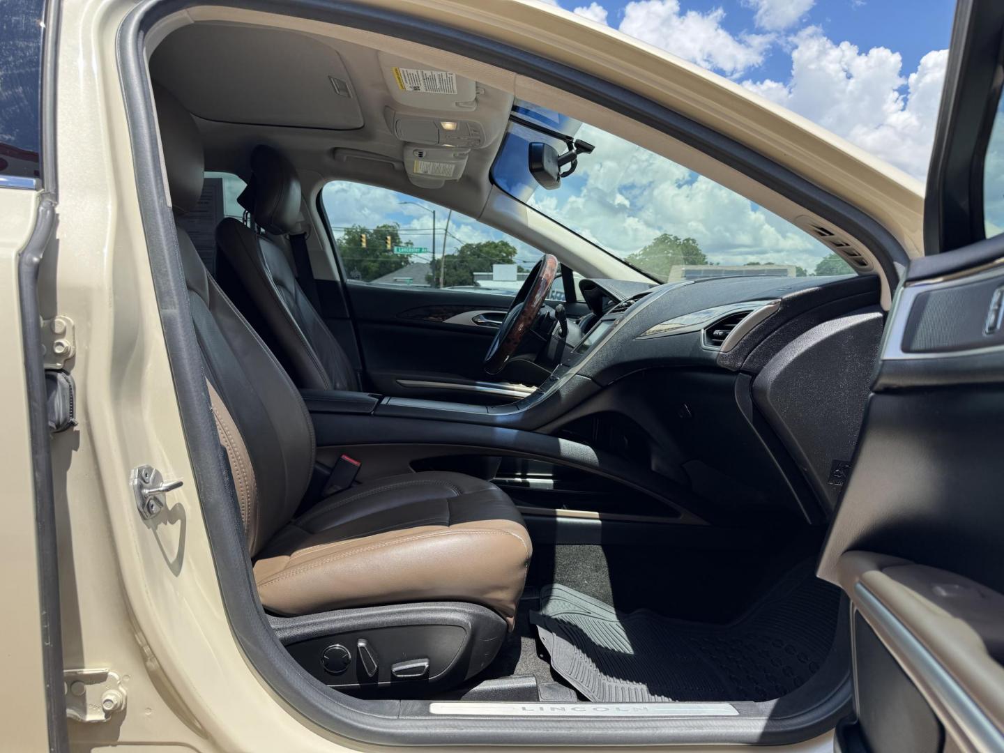 2016 TAN LINCOLN MKZ (3LN6L2GK8GR) , located at 5900 E. Lancaster Ave., Fort Worth, TX, 76112, (817) 457-5456, 0.000000, 0.000000 - This is a 2016 LINCOLN MKZ 4 DOOR SEDAN that is in excellent condition. There are no dents or scratches. The interior is clean with no rips or tears or stains. All power windows, door locks and seats. Ice cold AC for those hot Texas summer days. It is equipped with a CD player, AM/FM radio, AUX port - Photo#15