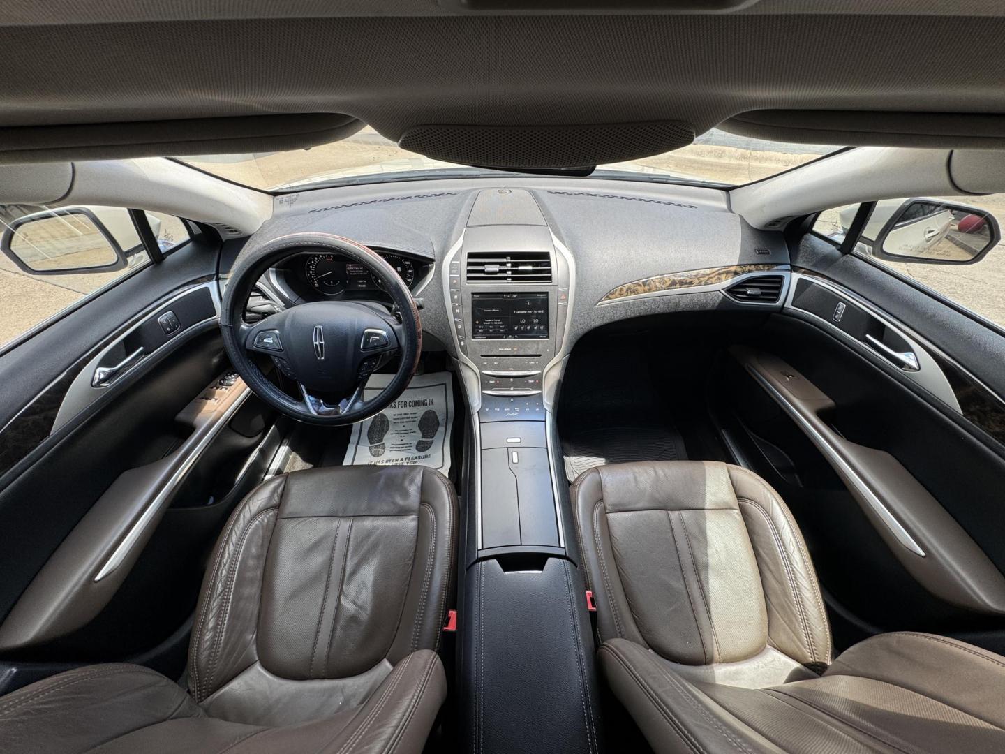 2016 TAN LINCOLN MKZ (3LN6L2GK8GR) , located at 5900 E. Lancaster Ave., Fort Worth, TX, 76112, (817) 457-5456, 0.000000, 0.000000 - This is a 2016 LINCOLN MKZ 4 DOOR SEDAN that is in excellent condition. There are no dents or scratches. The interior is clean with no rips or tears or stains. All power windows, door locks and seats. Ice cold AC for those hot Texas summer days. It is equipped with a CD player, AM/FM radio, AUX port - Photo#17