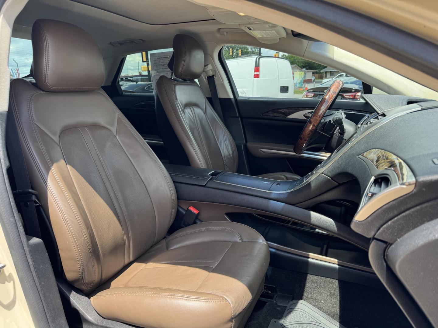 2016 TAN LINCOLN MKZ (3LN6L2GK8GR) , located at 5900 E. Lancaster Ave., Fort Worth, TX, 76112, (817) 457-5456, 0.000000, 0.000000 - This is a 2016 LINCOLN MKZ 4 DOOR SEDAN that is in excellent condition. There are no dents or scratches. The interior is clean with no rips or tears or stains. All power windows, door locks and seats. Ice cold AC for those hot Texas summer days. It is equipped with a CD player, AM/FM radio, AUX port - Photo#16