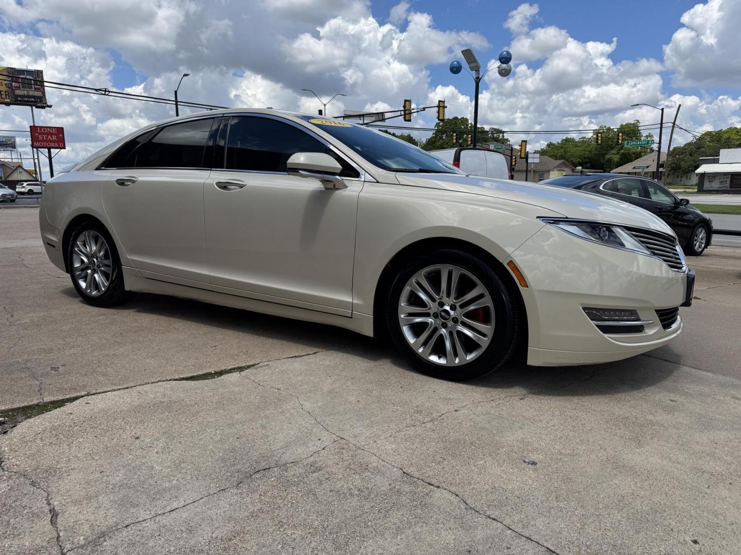 2016 TAN LINCOLN MKZ (3LN6L2GK8GR) , located at 5900 E. Lancaster Ave., Fort Worth, TX, 76112, (817) 457-5456, 0.000000, 0.000000 - This is a 2016 LINCOLN MKZ 4 DOOR SEDAN that is in excellent condition. There are no dents or scratches. The interior is clean with no rips or tears or stains. All power windows, door locks and seats. Ice cold AC for those hot Texas summer days. It is equipped with a CD player, AM/FM radio, AUX port - Photo#2