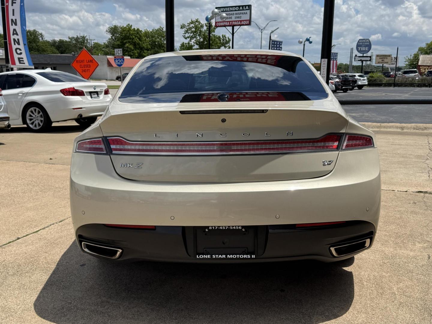 2016 TAN LINCOLN MKZ (3LN6L2GK8GR) , located at 5900 E. Lancaster Ave., Fort Worth, TX, 76112, (817) 457-5456, 0.000000, 0.000000 - This is a 2016 LINCOLN MKZ 4 DOOR SEDAN that is in excellent condition. There are no dents or scratches. The interior is clean with no rips or tears or stains. All power windows, door locks and seats. Ice cold AC for those hot Texas summer days. It is equipped with a CD player, AM/FM radio, AUX port - Photo#4