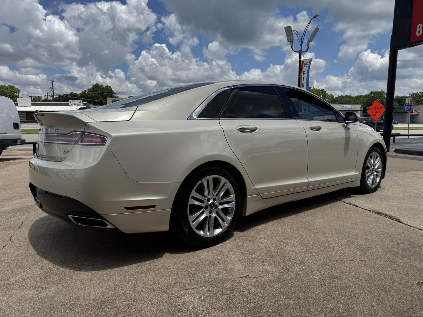 2016 TAN LINCOLN MKZ (3LN6L2GK8GR) , located at 5900 E. Lancaster Ave., Fort Worth, TX, 76112, (817) 457-5456, 0.000000, 0.000000 - This is a 2016 LINCOLN MKZ 4 DOOR SEDAN that is in excellent condition. There are no dents or scratches. The interior is clean with no rips or tears or stains. All power windows, door locks and seats. Ice cold AC for those hot Texas summer days. It is equipped with a CD player, AM/FM radio, AUX port - Photo#3