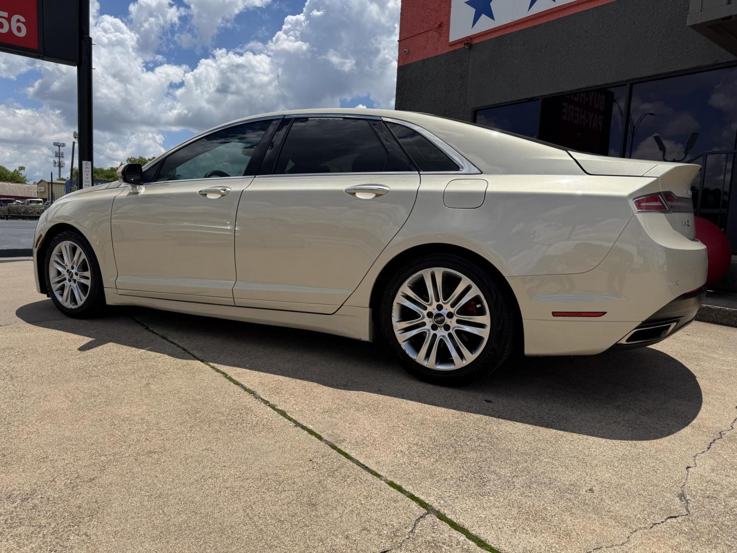 2016 TAN LINCOLN MKZ (3LN6L2GK8GR) , located at 5900 E. Lancaster Ave., Fort Worth, TX, 76112, (817) 457-5456, 0.000000, 0.000000 - This is a 2016 LINCOLN MKZ 4 DOOR SEDAN that is in excellent condition. There are no dents or scratches. The interior is clean with no rips or tears or stains. All power windows, door locks and seats. Ice cold AC for those hot Texas summer days. It is equipped with a CD player, AM/FM radio, AUX port - Photo#6