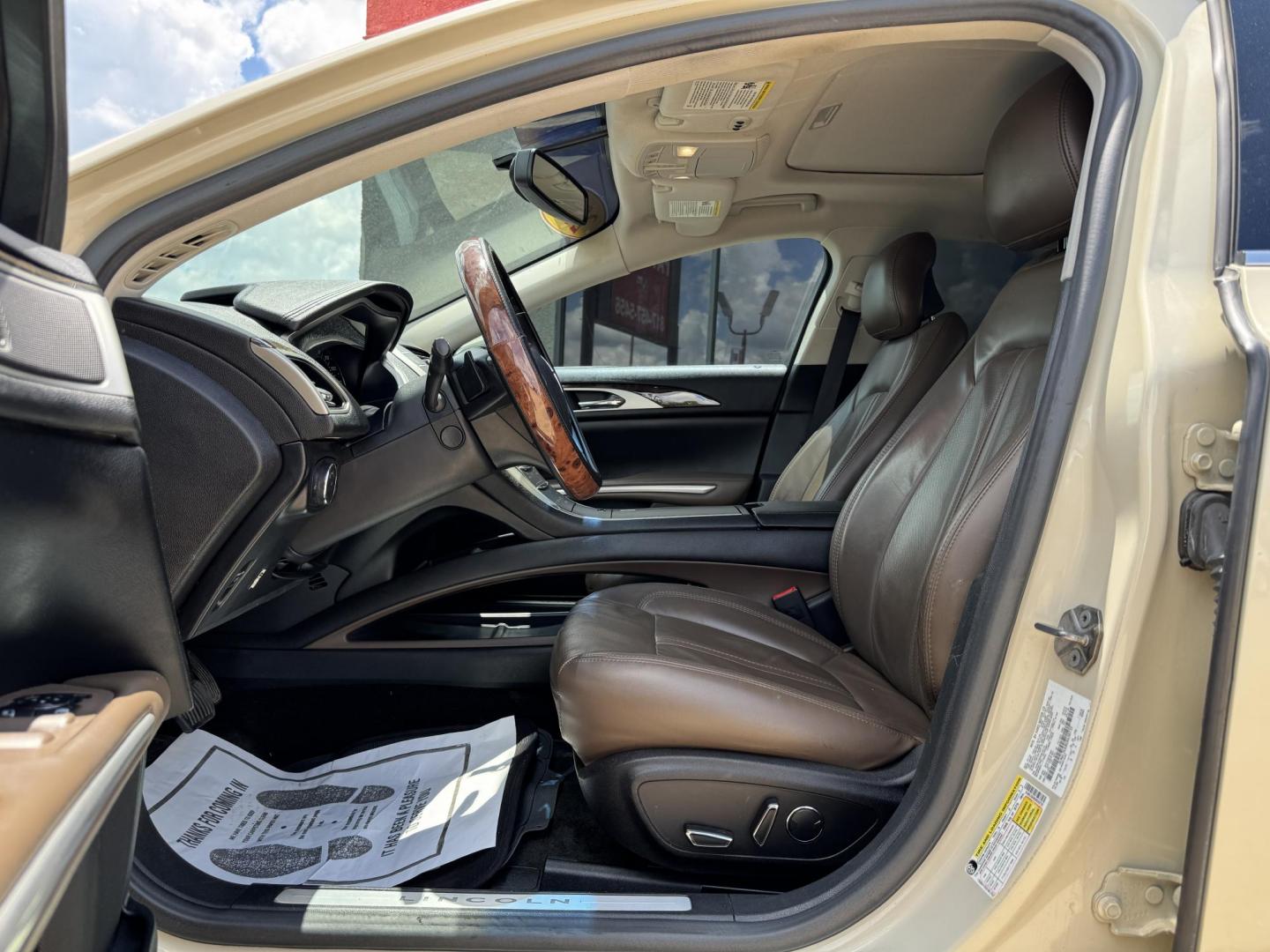 2016 TAN LINCOLN MKZ (3LN6L2GK8GR) , located at 5900 E. Lancaster Ave., Fort Worth, TX, 76112, (817) 457-5456, 0.000000, 0.000000 - This is a 2016 LINCOLN MKZ 4 DOOR SEDAN that is in excellent condition. There are no dents or scratches. The interior is clean with no rips or tears or stains. All power windows, door locks and seats. Ice cold AC for those hot Texas summer days. It is equipped with a CD player, AM/FM radio, AUX port - Photo#8