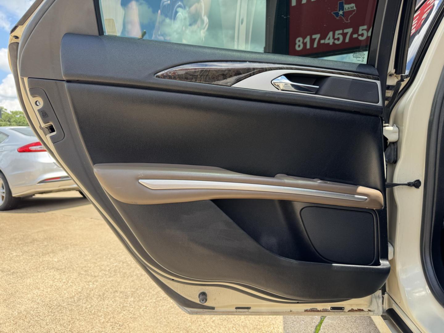 2016 TAN LINCOLN MKZ (3LN6L2GK8GR) , located at 5900 E. Lancaster Ave., Fort Worth, TX, 76112, (817) 457-5456, 0.000000, 0.000000 - This is a 2016 LINCOLN MKZ 4 DOOR SEDAN that is in excellent condition. There are no dents or scratches. The interior is clean with no rips or tears or stains. All power windows, door locks and seats. Ice cold AC for those hot Texas summer days. It is equipped with a CD player, AM/FM radio, AUX port - Photo#10
