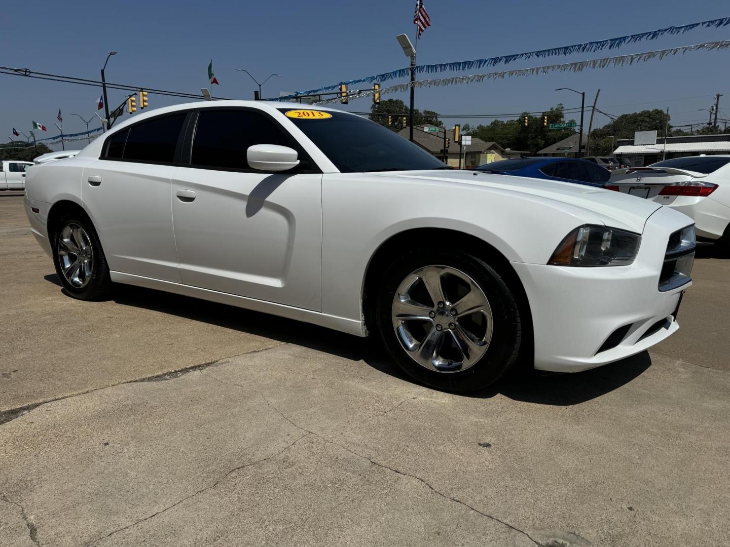 2013 WHITE DODGE CHARGER (2C3CDXBG2DH) , located at 5900 E. Lancaster Ave., Fort Worth, TX, 76112, (817) 457-5456, 0.000000, 0.000000 - This is a 2013 DODGE CHARGER 4 DOOR SEDAN that is in excellent condition. There are no dents or scratches. The interior is clean with no rips or tears or stains. All power windows, door locks and seats. Ice cold AC for those hot Texas summer days. It is equipped with a CD player, AM/FM radio, AUX po - Photo#3