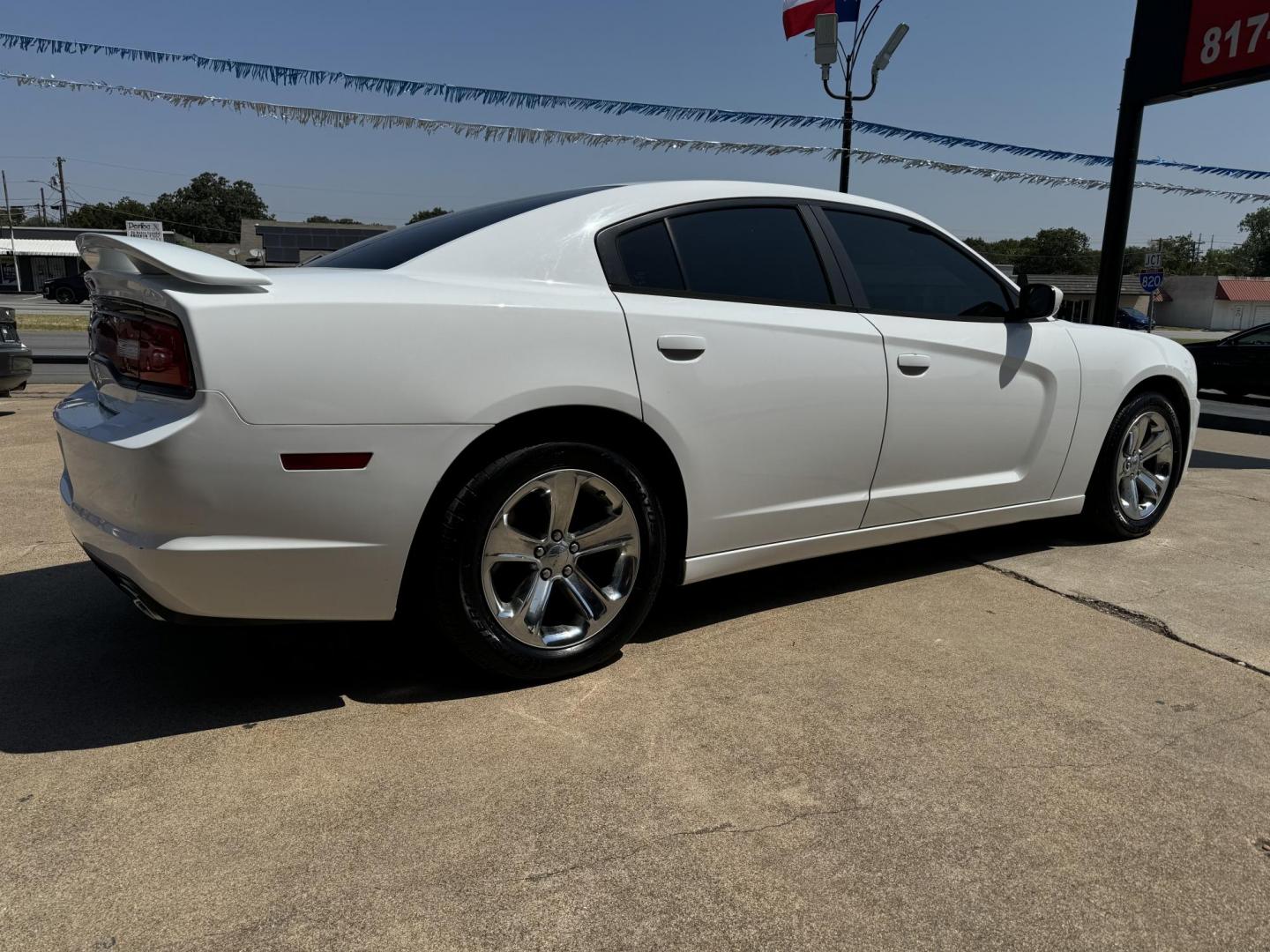 2013 WHITE DODGE CHARGER (2C3CDXBG2DH) , located at 5900 E. Lancaster Ave., Fort Worth, TX, 76112, (817) 457-5456, 0.000000, 0.000000 - This is a 2013 DODGE CHARGER 4 DOOR SEDAN that is in excellent condition. There are no dents or scratches. The interior is clean with no rips or tears or stains. All power windows, door locks and seats. Ice cold AC for those hot Texas summer days. It is equipped with a CD player, AM/FM radio, AUX po - Photo#4