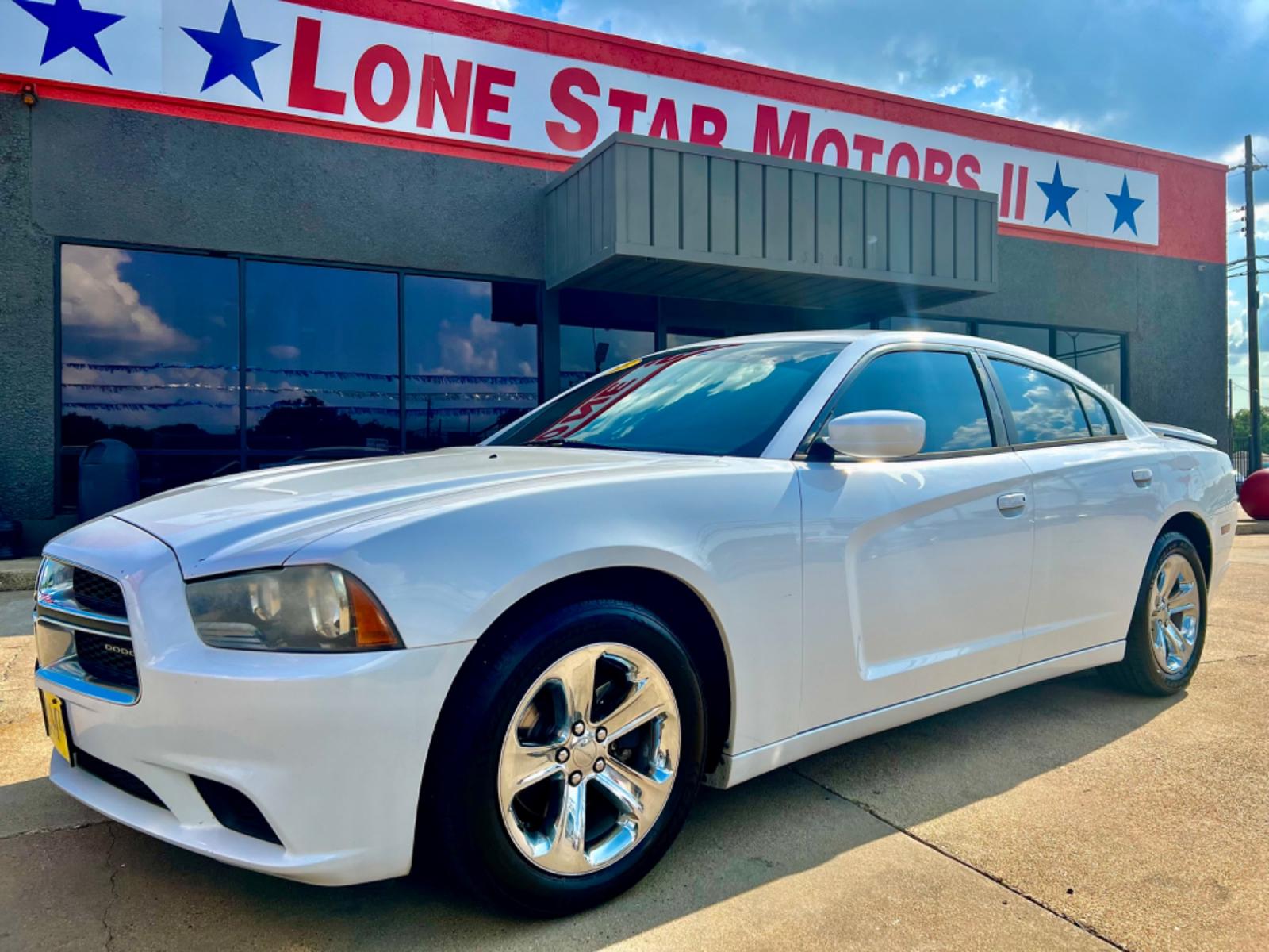 2013 WHITE DODGE CHARGER (2C3CDXBG2DH) , located at 5900 E. Lancaster Ave., Fort Worth, TX, 76112, (817) 457-5456, 0.000000, 0.000000 - This is a 2013 DODGE CHARGER 4 DOOR SEDAN that is in excellent condition. There are no dents or scratches. The interior is clean with no rips or tears or stains. All power windows, door locks and seats. Ice cold AC for those hot Texas summer days. It is equipped with a CD player, AM/FM radio, AUX po - Photo #1