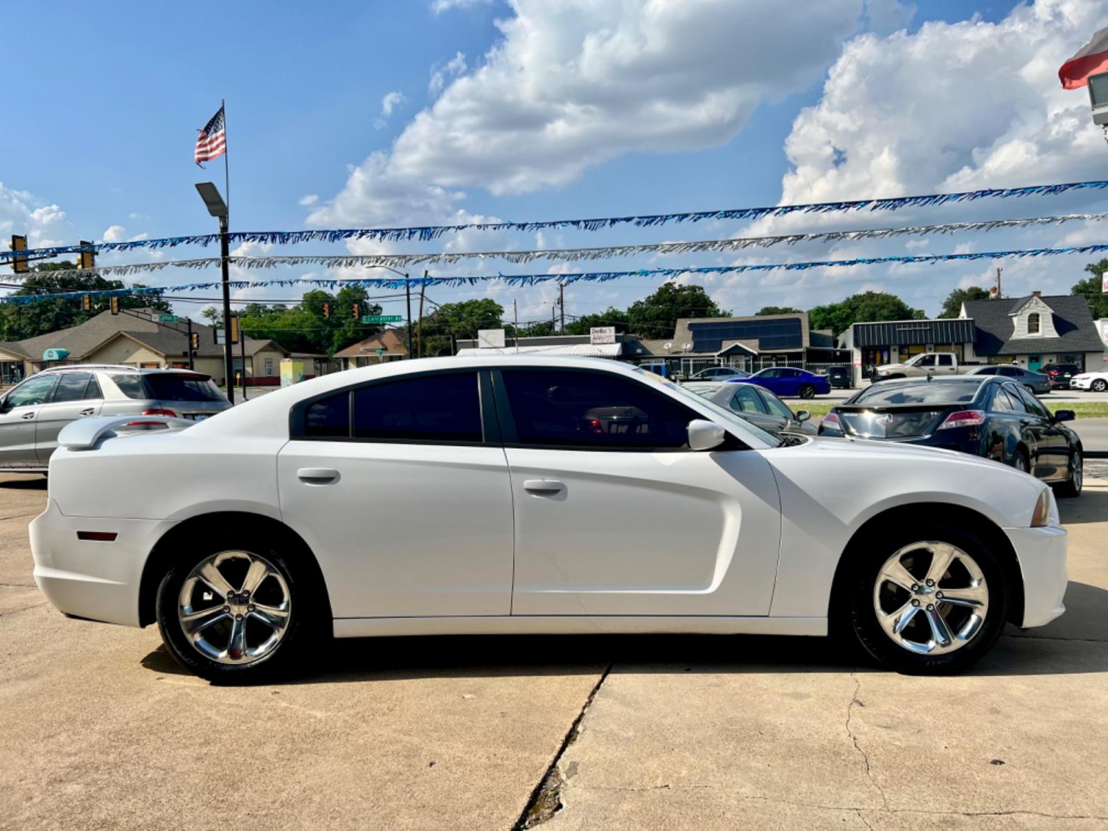 2013 WHITE DODGE CHARGER (2C3CDXBG2DH) , located at 5900 E. Lancaster Ave., Fort Worth, TX, 76112, (817) 457-5456, 0.000000, 0.000000 - This is a 2013 DODGE CHARGER 4 DOOR SEDAN that is in excellent condition. There are no dents or scratches. The interior is clean with no rips or tears or stains. All power windows, door locks and seats. Ice cold AC for those hot Texas summer days. It is equipped with a CD player, AM/FM radio, AUX po - Photo #7