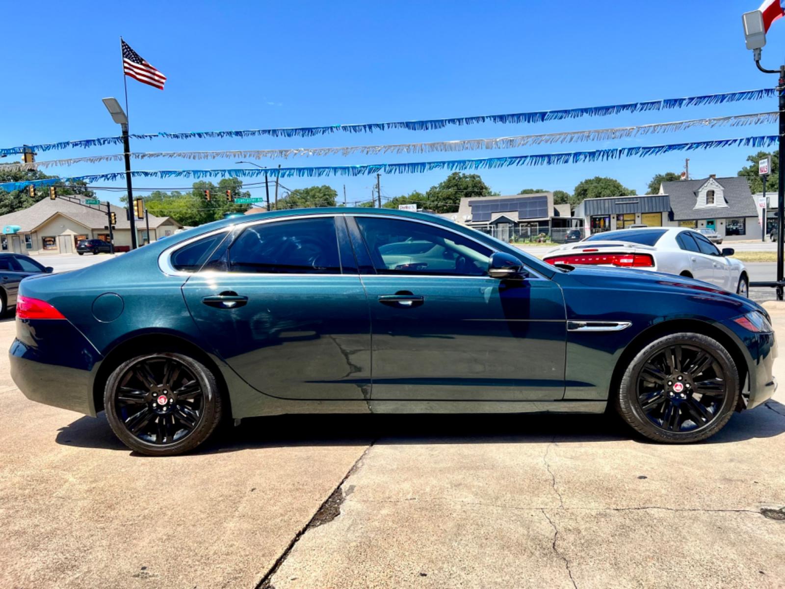 2017 GREEN /Tan JAGUAR XF (SAJBD4BV3HC) , located at 5900 E. Lancaster Ave., Fort Worth, TX, 76112, (817) 457-5456, 0.000000, 0.000000 - This is a 2017 JAGUAR XF 4 DOOR SEDAN that is in excellent condition. There are no dents or scratches. The interior is clean with no rips or tears or stains. All power windows, door locks and seats. Ice cold AC for those hot Texas summer days. It is equipped with a CD player, AM/FM radio, AUX port, - Photo #7