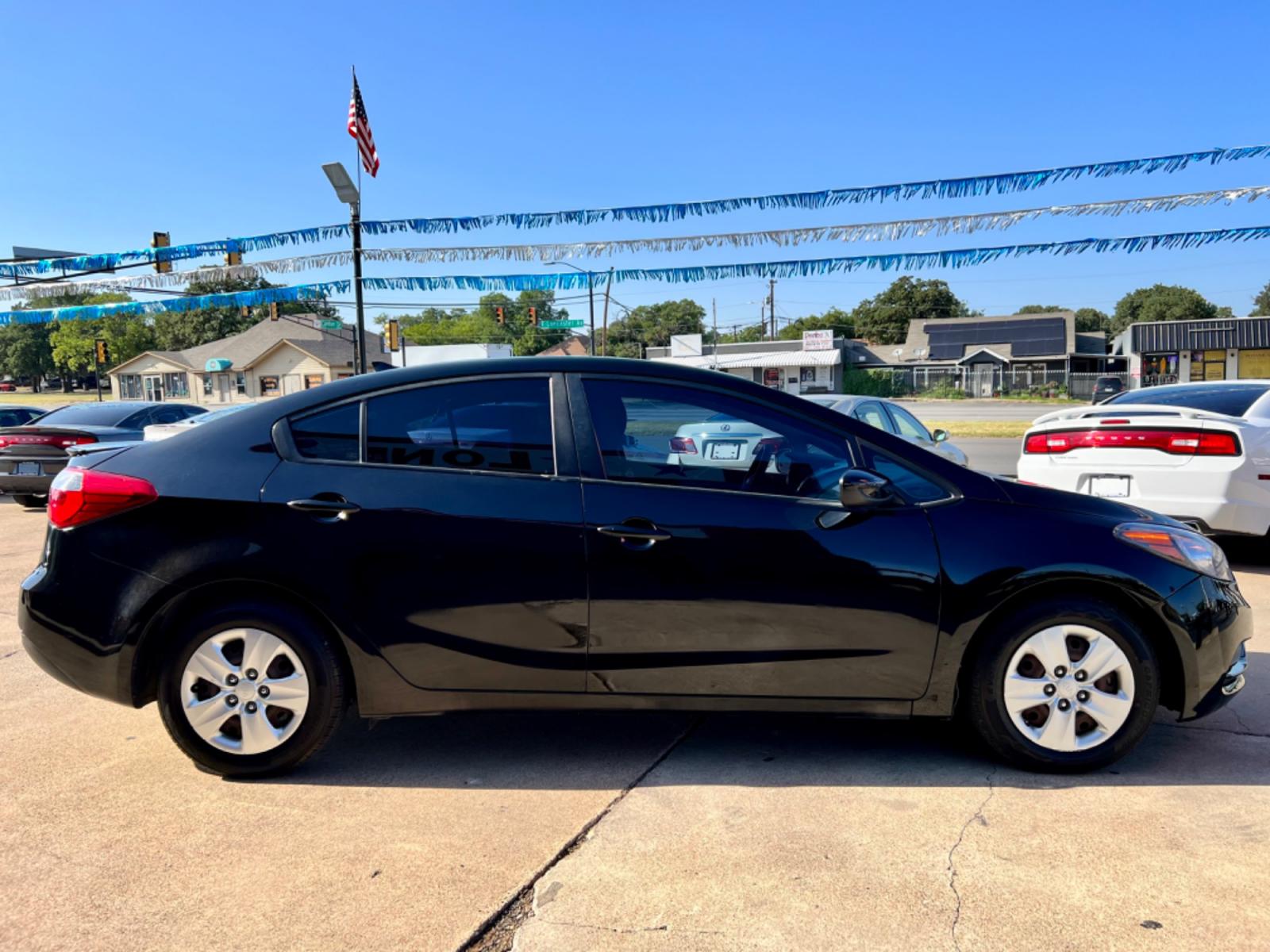 2016 BLACK KIA FORTE (KNAFK4A61G5) , located at 5900 E. Lancaster Ave., Fort Worth, TX, 76112, (817) 457-5456, 0.000000, 0.000000 - This is a 2016 KIA FORTE 4 DOOR SEDAN that is in excellent condition. There are no dents or scratches. The interior is clean with no rips or tears or stains. All power windows, door locks and seats. Ice cold AC for those hot Texas summer days. It is equipped with a CD player, AM/FM radio, AUX port, - Photo #7