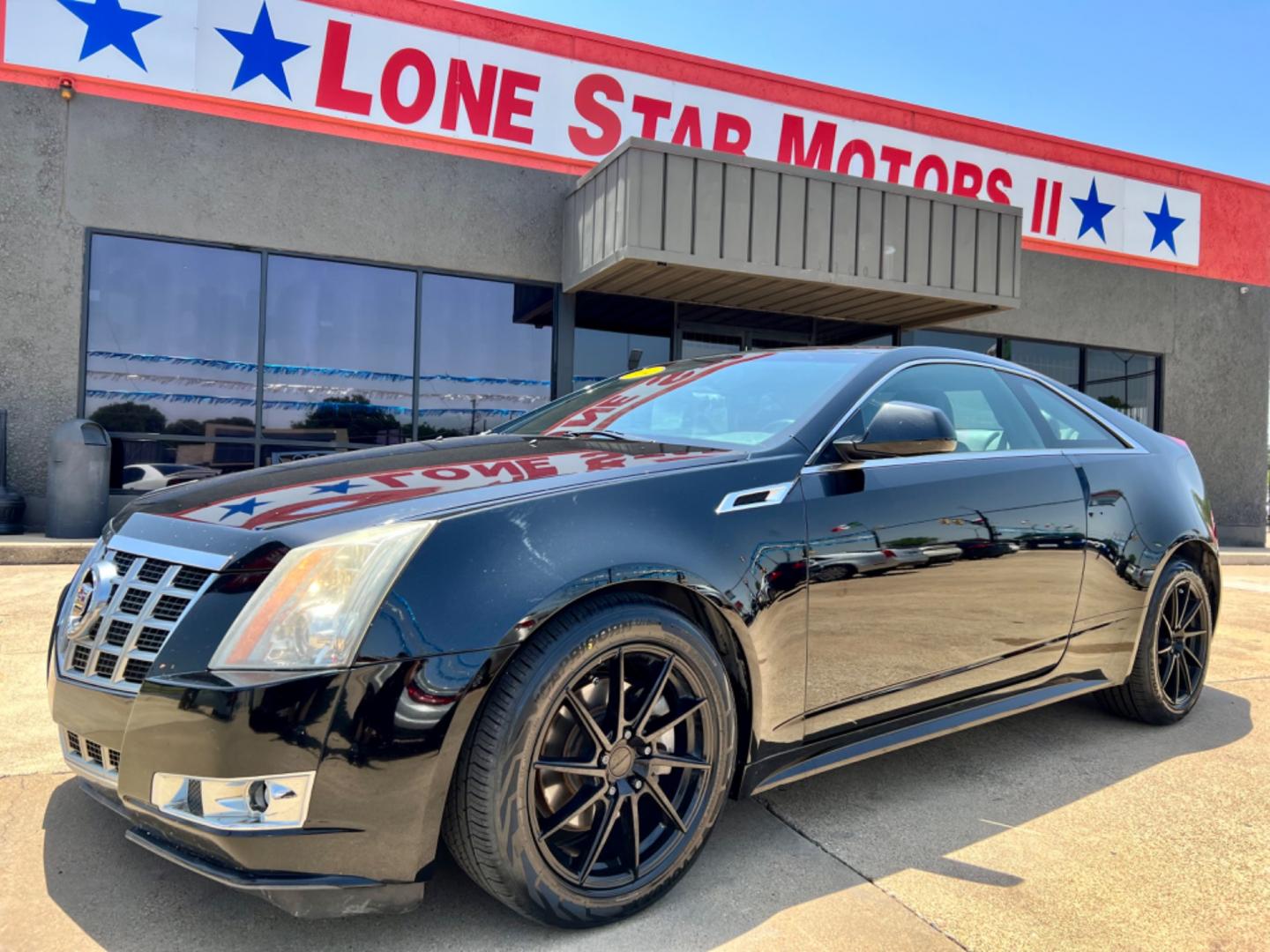 2014 BLACK CADILLAC CTS (1G6DC1E3XE0) , located at 5900 E. Lancaster Ave., Fort Worth, TX, 76112, (817) 457-5456, 0.000000, 0.000000 - This is a 2014 CADILLAC CTS 2 DOOR COUPE that is in excellent condition. There are no dents or scratches. The interior is clean with no rips or tears or stains. All power windows, door locks and seats. Ice cold AC for those hot Texas summer days. It is equipped with a CD player, AM/FM radio, AUX por - Photo#0