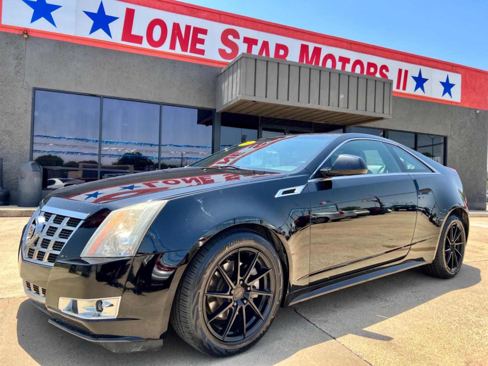 2014 BLACK CADILLAC CTS (1G6DC1E3XE0) , located at 5900 E. Lancaster Ave., Fort Worth, TX, 76112, (817) 457-5456, 0.000000, 0.000000 - This is a 2014 CADILLAC CTS 2 DOOR COUPE that is in excellent condition. There are no dents or scratches. The interior is clean with no rips or tears or stains. All power windows, door locks and seats. Ice cold AC for those hot Texas summer days. It is equipped with a CD player, AM/FM radio, AUX por - Photo #1