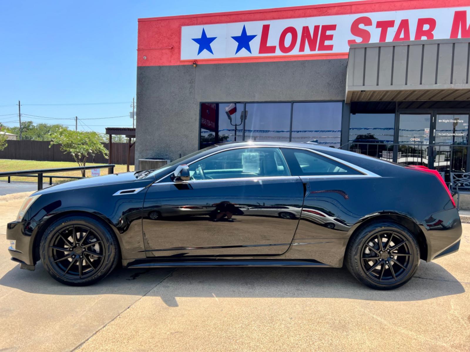 2014 BLACK CADILLAC CTS (1G6DC1E3XE0) , located at 5900 E. Lancaster Ave., Fort Worth, TX, 76112, (817) 457-5456, 0.000000, 0.000000 - This is a 2014 CADILLAC CTS 2 DOOR COUPE that is in excellent condition. There are no dents or scratches. The interior is clean with no rips or tears or stains. All power windows, door locks and seats. Ice cold AC for those hot Texas summer days. It is equipped with a CD player, AM/FM radio, AUX por - Photo #3