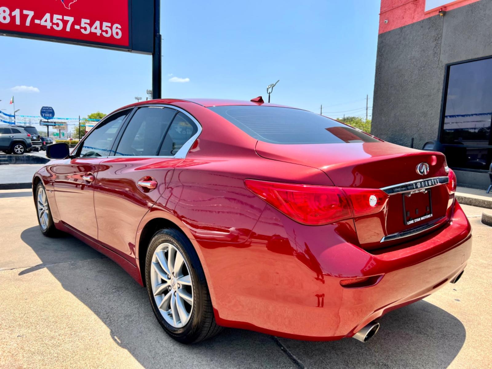 2014 RED INFINITI Q50 (JN1BV7AP9EM) , located at 5900 E. Lancaster Ave., Fort Worth, TX, 76112, (817) 457-5456, 0.000000, 0.000000 - This is a 2014 INFINITI Q50 4 DOOR SEDAN that is in excellent condition. There are no dents or scratches. The interior is clean with no rips or tears or stains. All power windows, door locks and seats. Ice cold AC for those hot Texas summer days. It is equipped with a CD player, AM/FM radio, AUX por - Photo #4