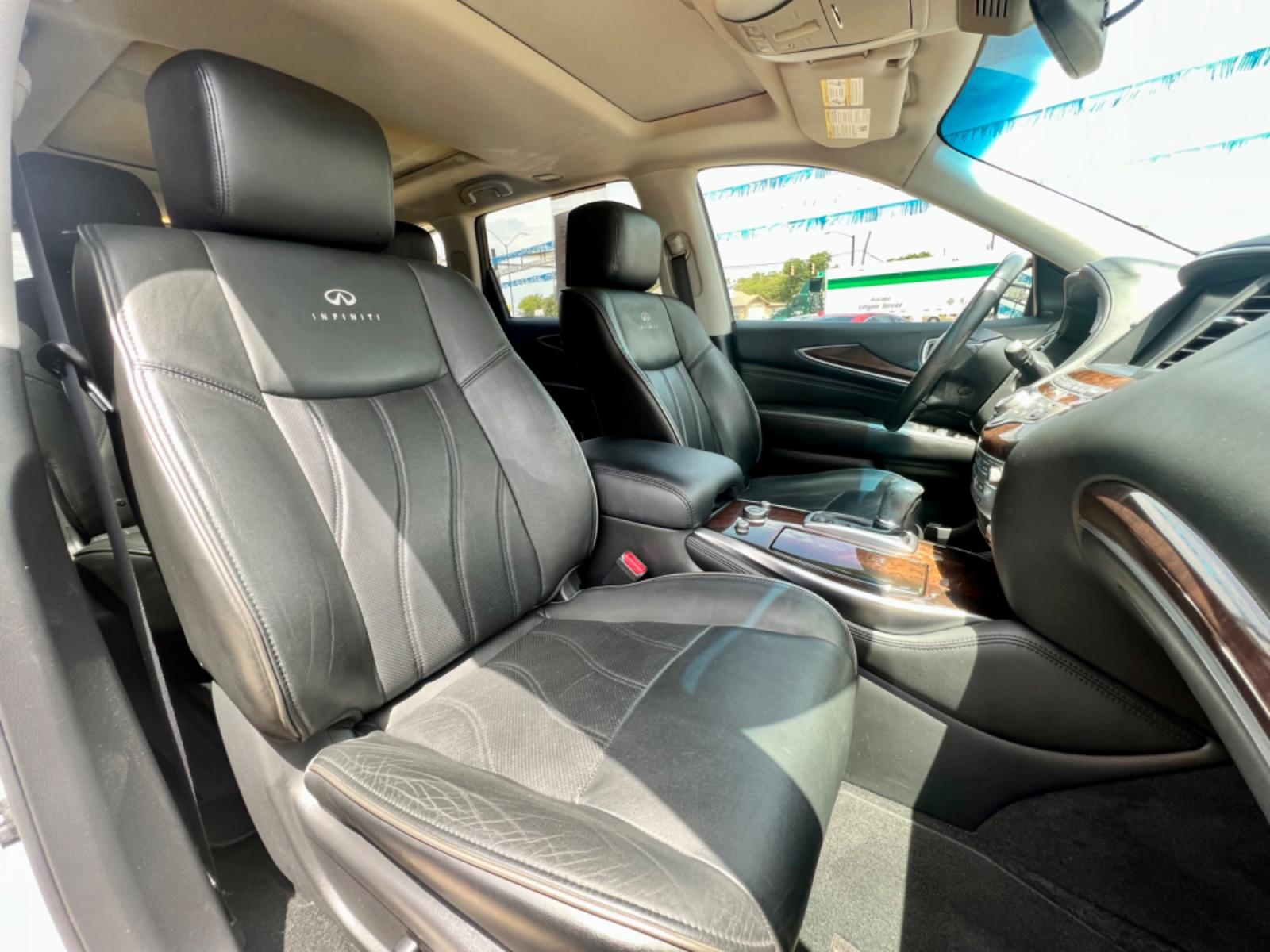 2013 SILVER INFINITI JX35 (5N1AL0MM3DC) , located at 5900 E. Lancaster Ave., Fort Worth, TX, 76112, (817) 457-5456, 0.000000, 0.000000 - This is a 2013 INFINITI JX35 4 DOOR SUV that is in excellent condition. There are no dents or scratches. The interior is clean with no rips or tears or stains. All power windows, door locks and seats. Ice cold AC for those hot Texas summer days. It is equipped with a CD player, AM/FM radio, AUX port - Photo #17