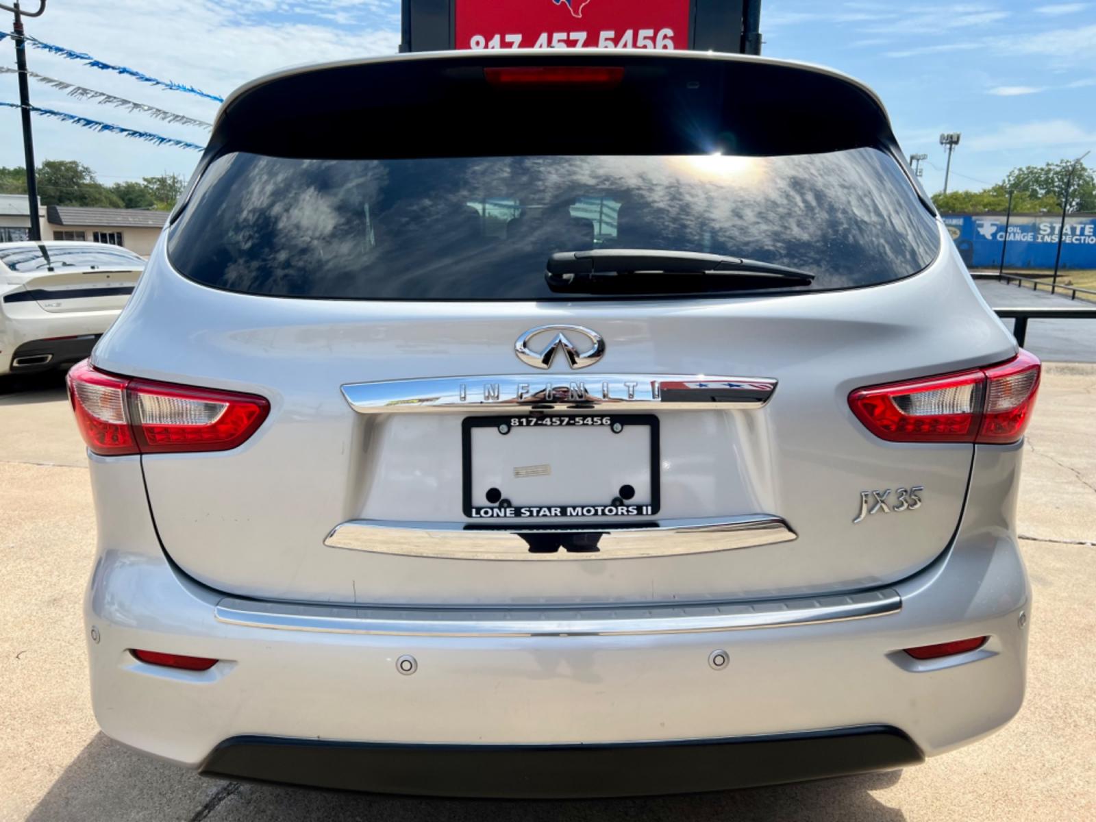 2013 SILVER INFINITI JX35 (5N1AL0MM3DC) , located at 5900 E. Lancaster Ave., Fort Worth, TX, 76112, (817) 457-5456, 0.000000, 0.000000 - This is a 2013 INFINITI JX35 4 DOOR SUV that is in excellent condition. There are no dents or scratches. The interior is clean with no rips or tears or stains. All power windows, door locks and seats. Ice cold AC for those hot Texas summer days. It is equipped with a CD player, AM/FM radio, AUX port - Photo #5