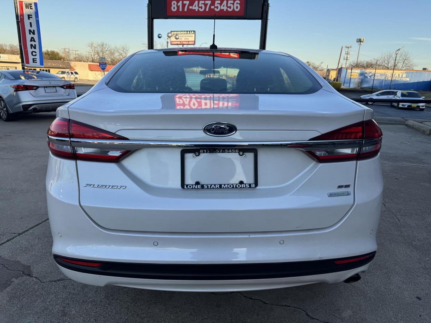 2017 WHITE /Black FORD FUSION (3FA6P0HD5HR) , located at 5900 E. Lancaster Ave., Fort Worth, TX, 76112, (817) 457-5456, 0.000000, 0.000000 - This is a 2017 FORD FUSION 4 DOOR SEDAN that is in excellent condition. There are no dents or scratches. The interior is clean with no rips or tears or stains. All power windows, door locks and seats. Ice cold AC for those hot Texas summer days. It is equipped with a CD player, AM/FM radio, AUX port - Photo#5