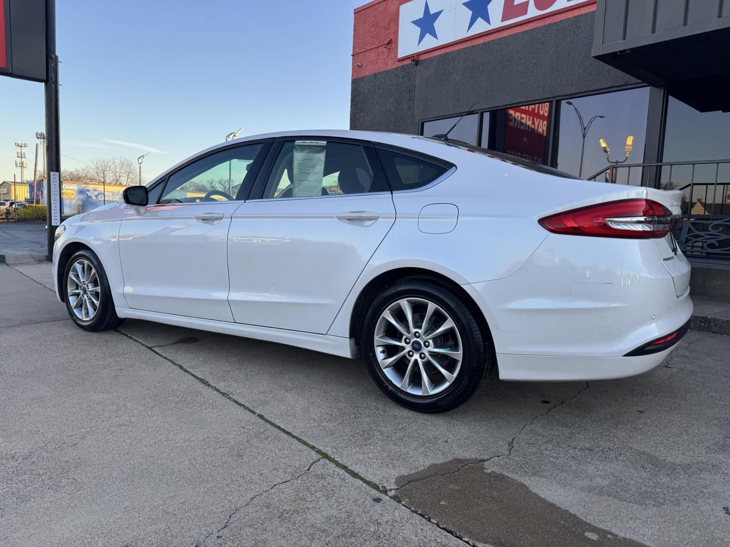 2017 WHITE /Black FORD FUSION (3FA6P0HD5HR) , located at 5900 E. Lancaster Ave., Fort Worth, TX, 76112, (817) 457-5456, 0.000000, 0.000000 - This is a 2017 FORD FUSION 4 DOOR SEDAN that is in excellent condition. There are no dents or scratches. The interior is clean with no rips or tears or stains. All power windows, door locks and seats. Ice cold AC for those hot Texas summer days. It is equipped with a CD player, AM/FM radio, AUX port - Photo#7